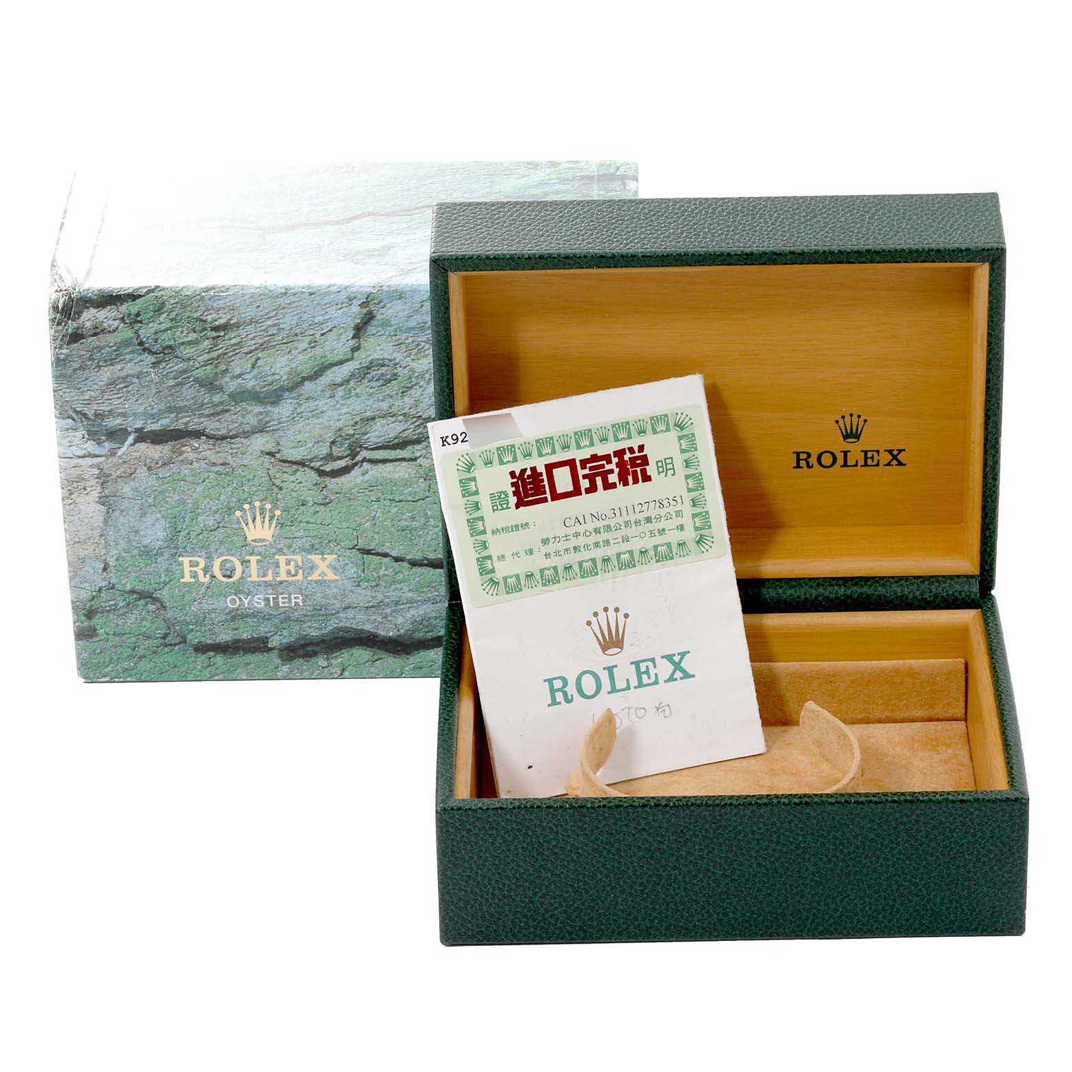 This image shows the box and documents for a Rolex Explorer 16570 Men's Stainless Steel White Dial 16570 Men's Stainless Steel White Dial watch, including the outer green box, the inner presentation box, and paperwork.