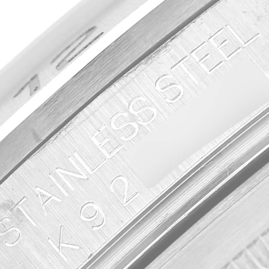 This close-up image shows the stainless steel back case of a Rolex Explorer 16570 Men's Stainless Steel White Dial 16570 Men's Stainless Steel White Dial watch.