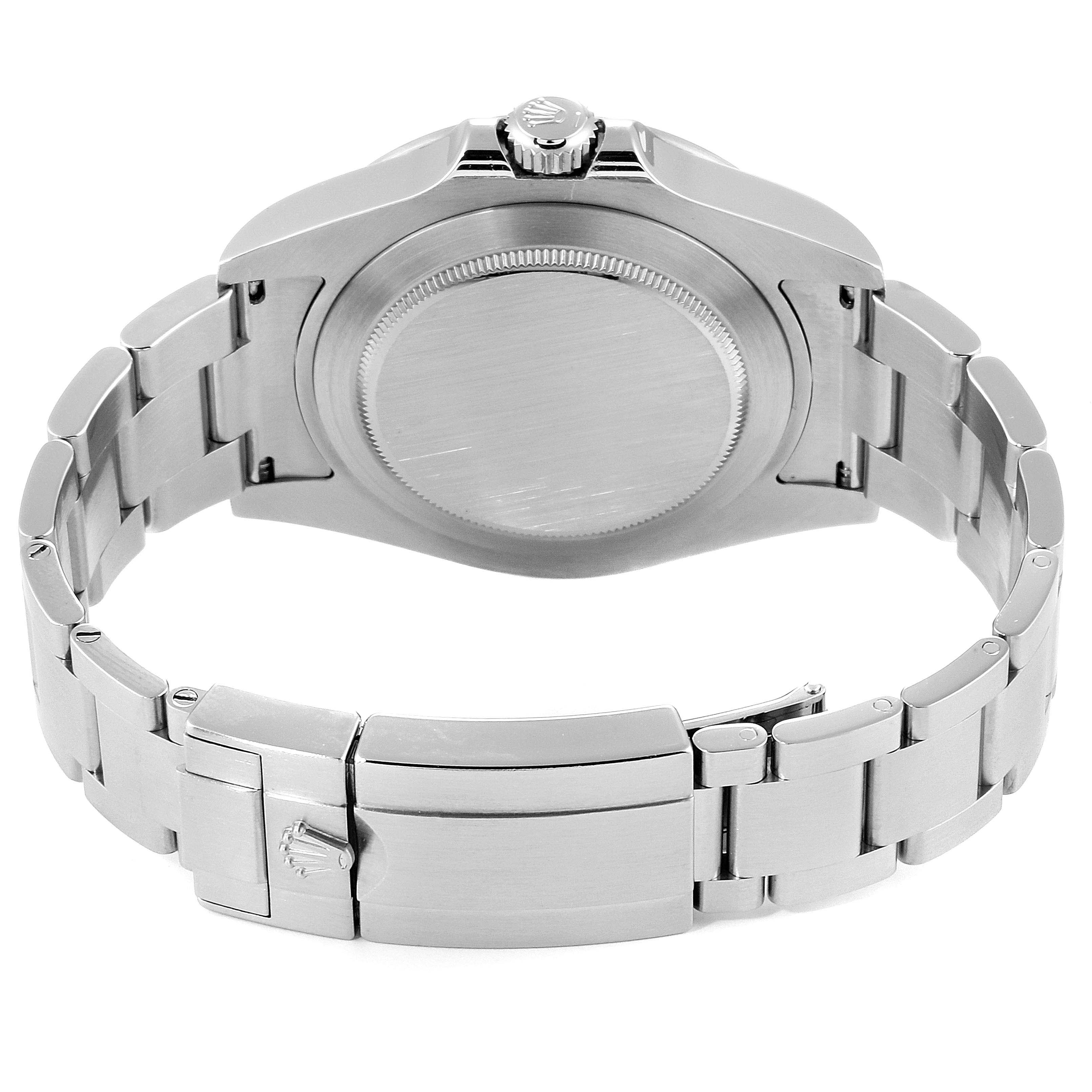 The image shows the back view of a Rolex Explorer 216570 Men
s Stainless Steel White Dial 216570 Men
s Stainless Steel White Dial watch, highlighting the case back, crown, and stainless steel bracelet.