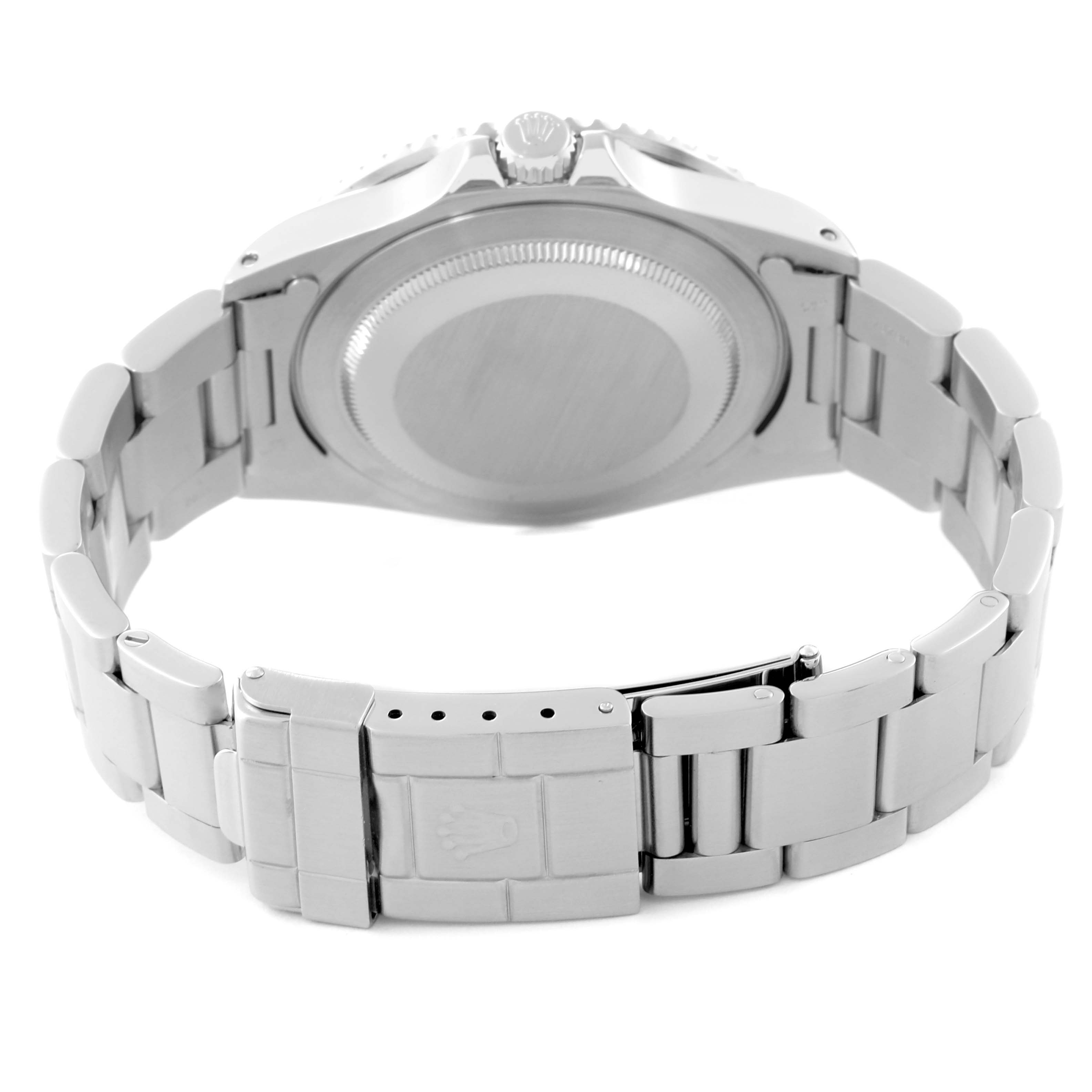 This photo shows the back of the Rolex GMT-Master 16700 Men's Stainless Steel Black Dial 16700 Men's Stainless Steel Black Dial, including the clasp, bracelet, and case back.