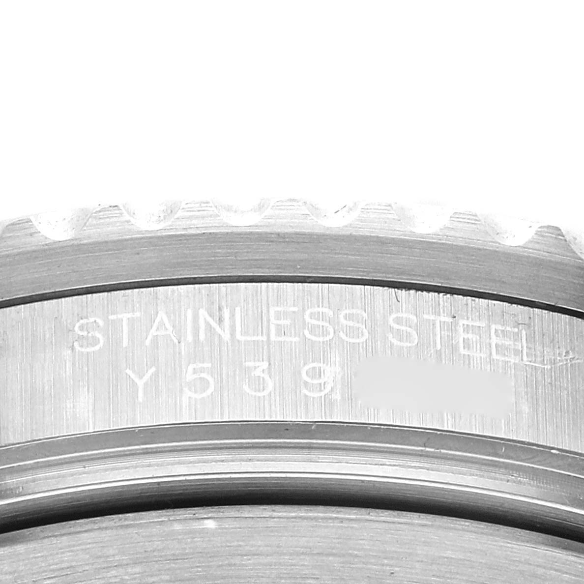 The image shows a close-up of the bezel and part of the case back of a Rolex GMT-Master 16710 Men's Stainless Steel Black Dial 16710 Men's Stainless Steel Black Dial, featuring "STAINLESS STEEL" engraving.