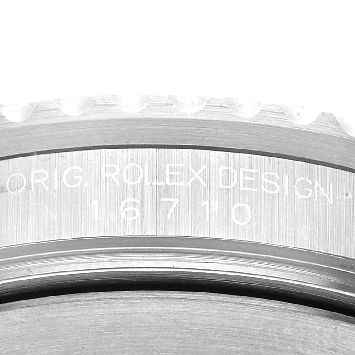 This image shows a close-up of the engraved case back and model number of a Rolex GMT-Master 16710 Men's Stainless Steel Black Dial 16710 Men's Stainless Steel Black Dial.