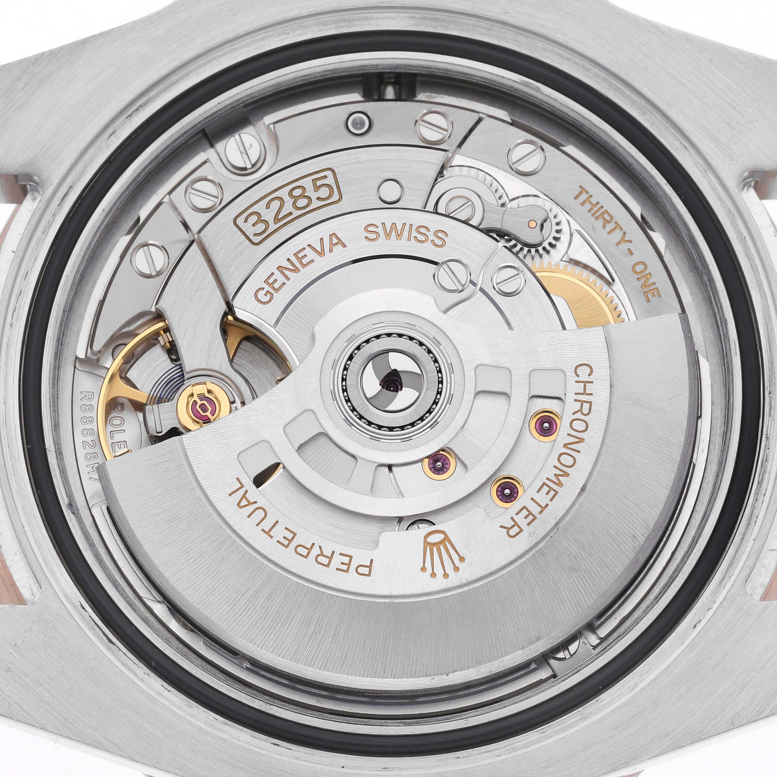 The image shows the intricate movement and rotor of a Rolex GMT-Master 126711 Men's Steel and Gold (two tone) Black Dial 126711 Men's Steel and Gold (two tone) Black Dial, viewed from the back.