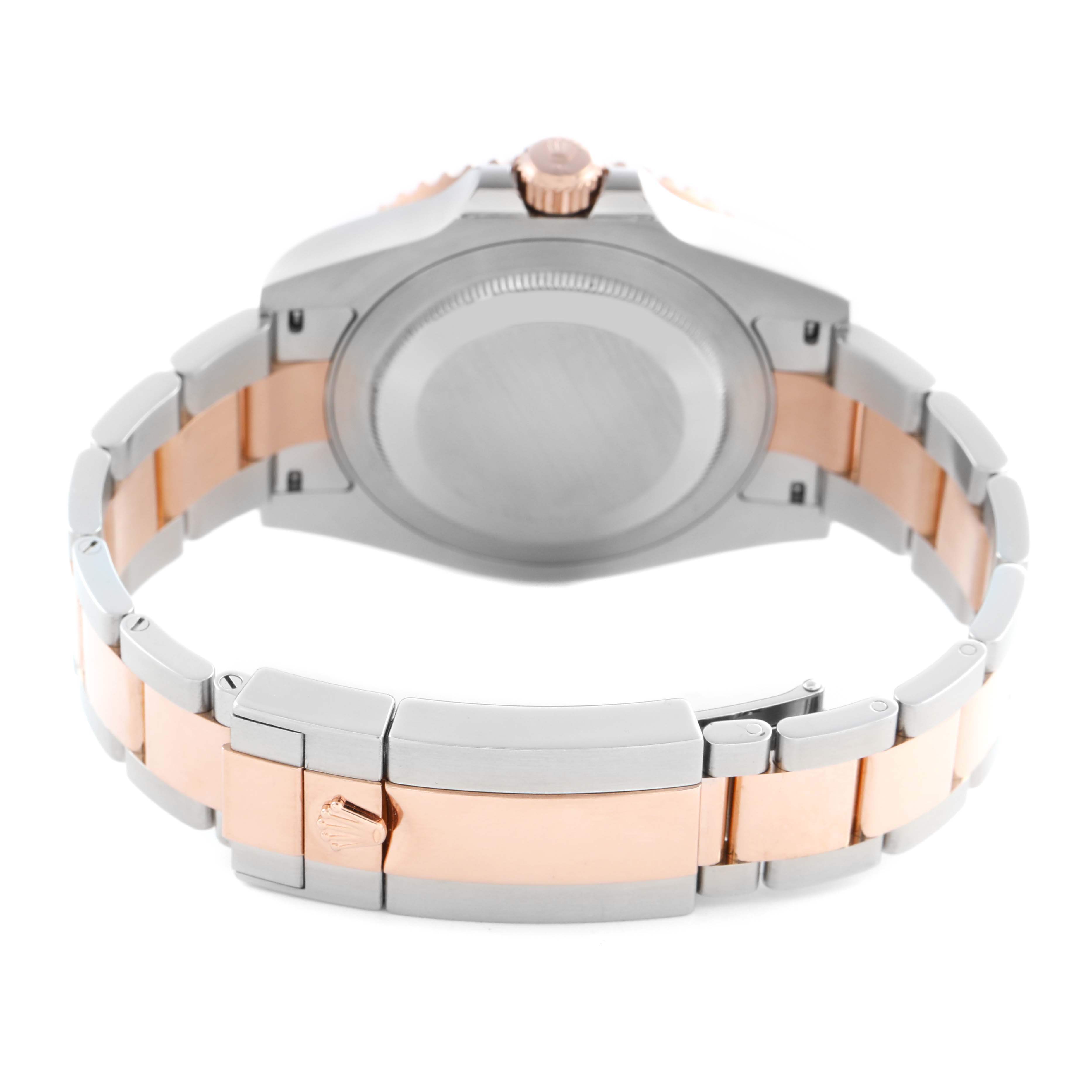 The image shows the back view of a Rolex GMT-Master 126711 Men's Steel and Gold (two tone) Black Dial 126711 Men's Steel and Gold (two tone) Black Dial watch, highlighting the case back, crown, and two-tone bracelet.