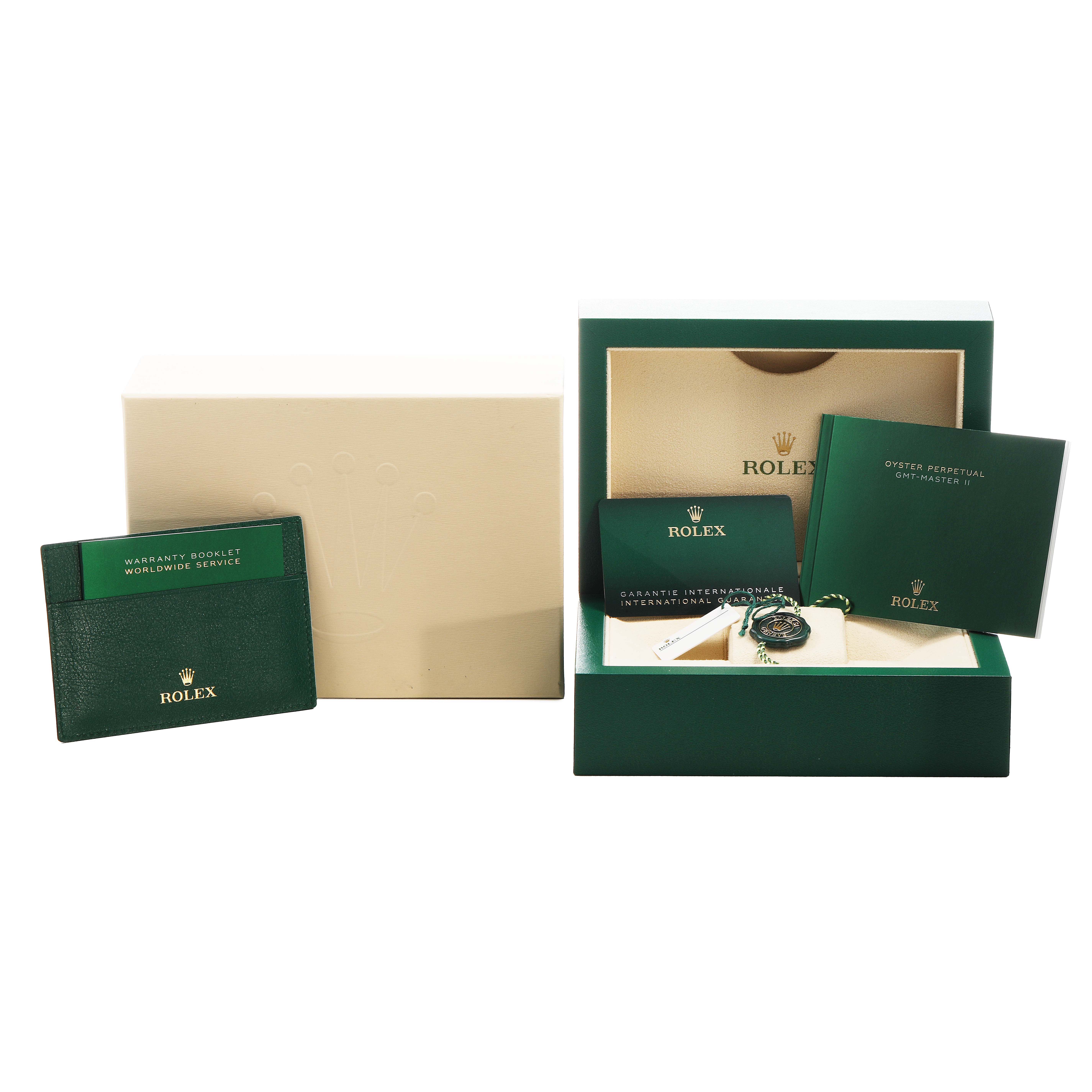 The image shows the Rolex GMT-Master 126710 Men's Stainless Steel Black Dial watch box, booklets, warranty card, and accessories from a front angle.
