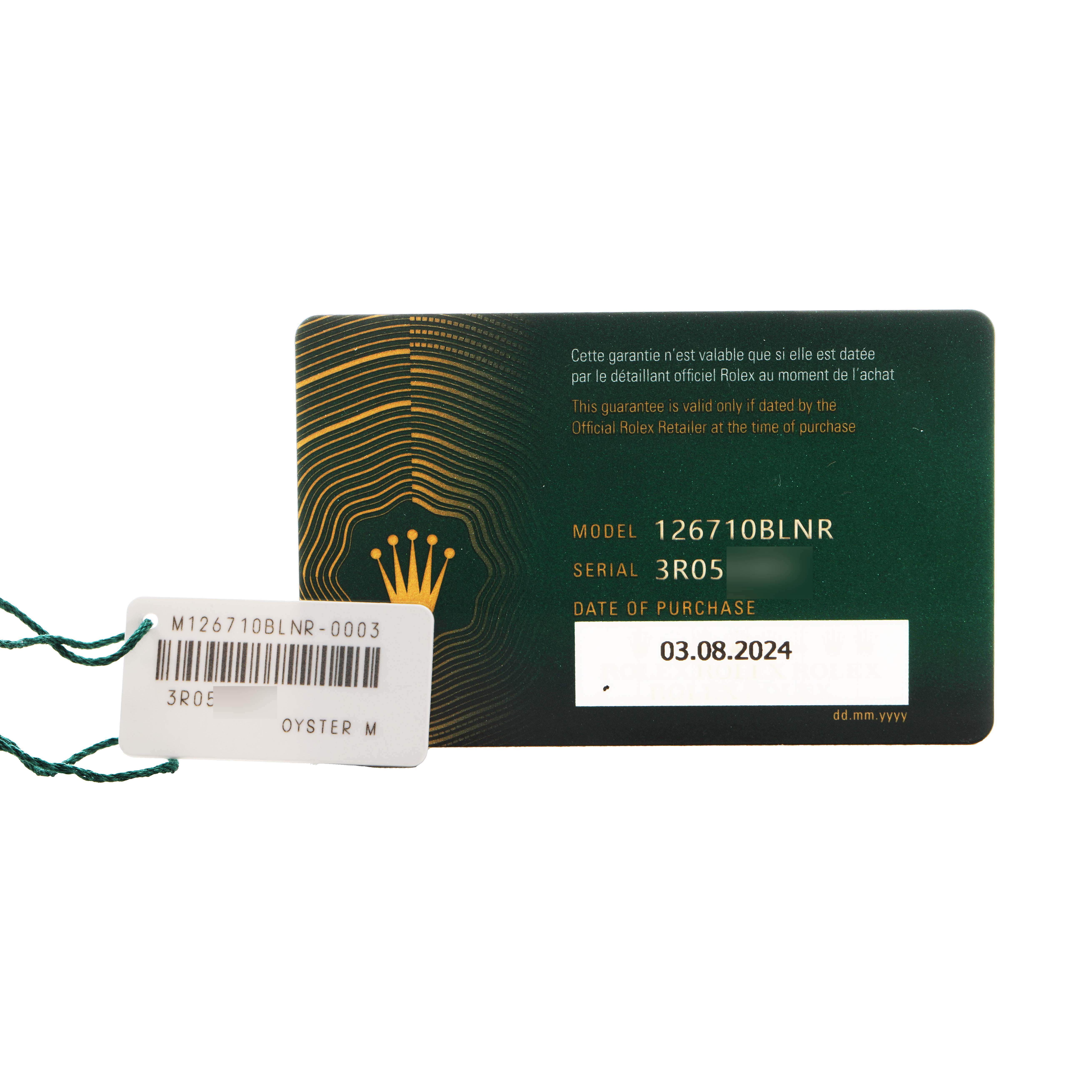 The image shows a Rolex GMT-Master 126710 Men's Stainless Steel Black Dial warranty card with model and serial numbers, plus a tag with model details.