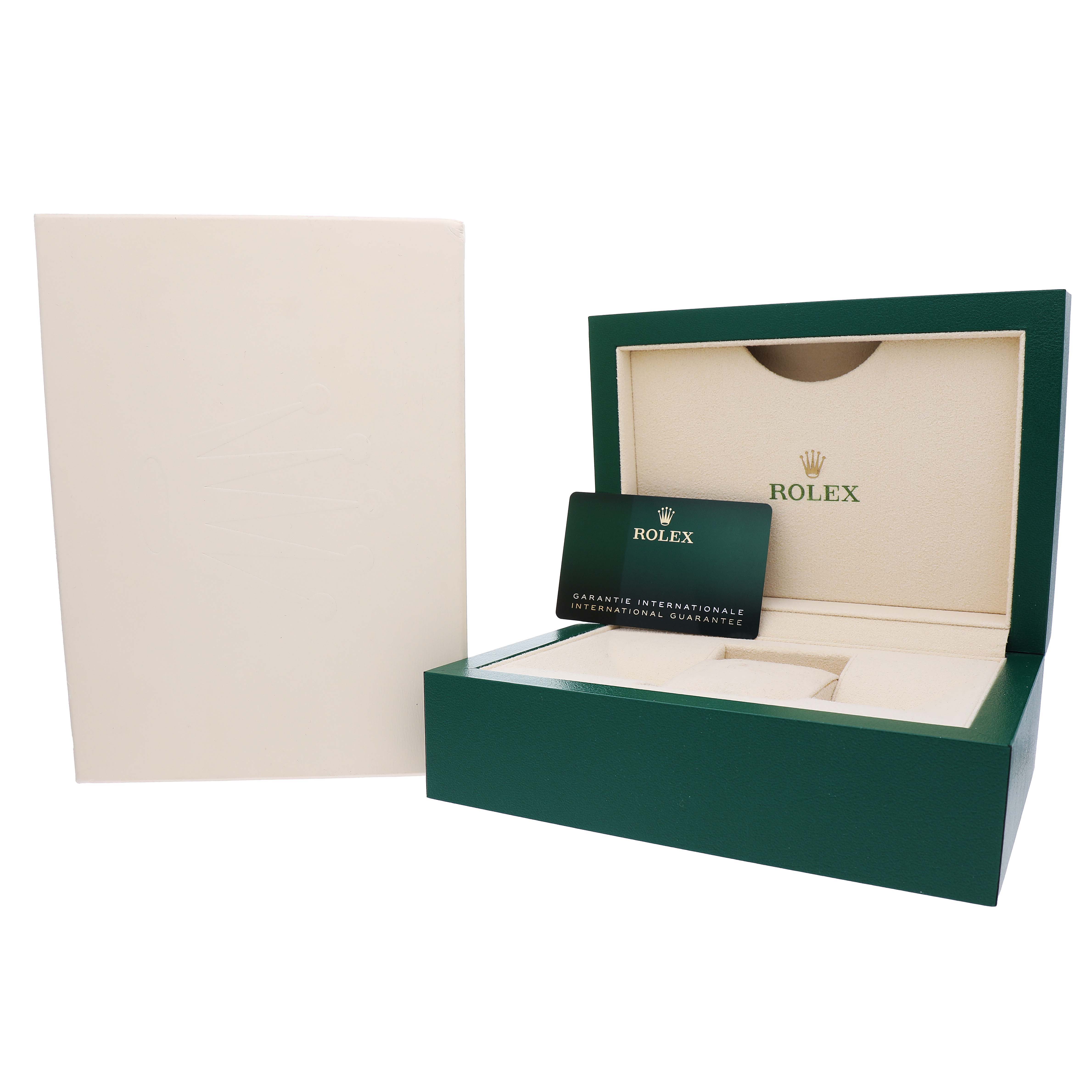 The image shows the packaging and guarantee card for a Rolex GMT-Master 126710 Men's Stainless Steel Black Dial watch.
