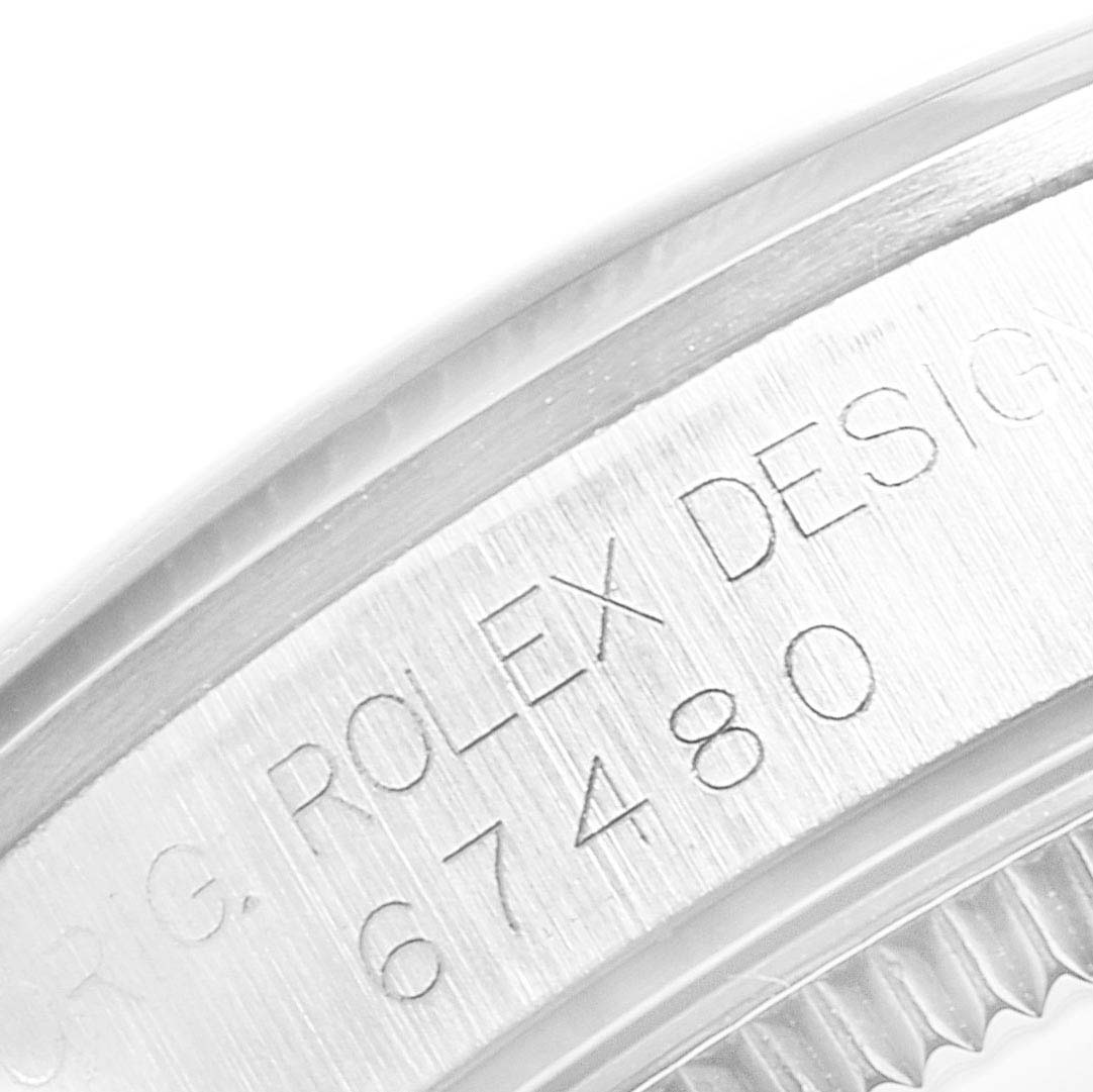 This image shows a close-up angle of the case side with the serial number of a Mid-Size Rolex watch.