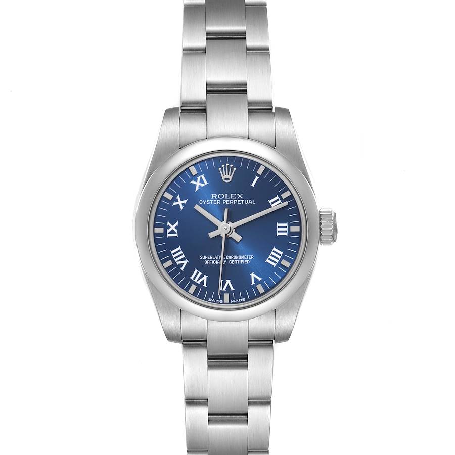 The Rolex Oyster Perpetual watch is shown from a front angle, displaying the bracelet, blue dial, and bezel.