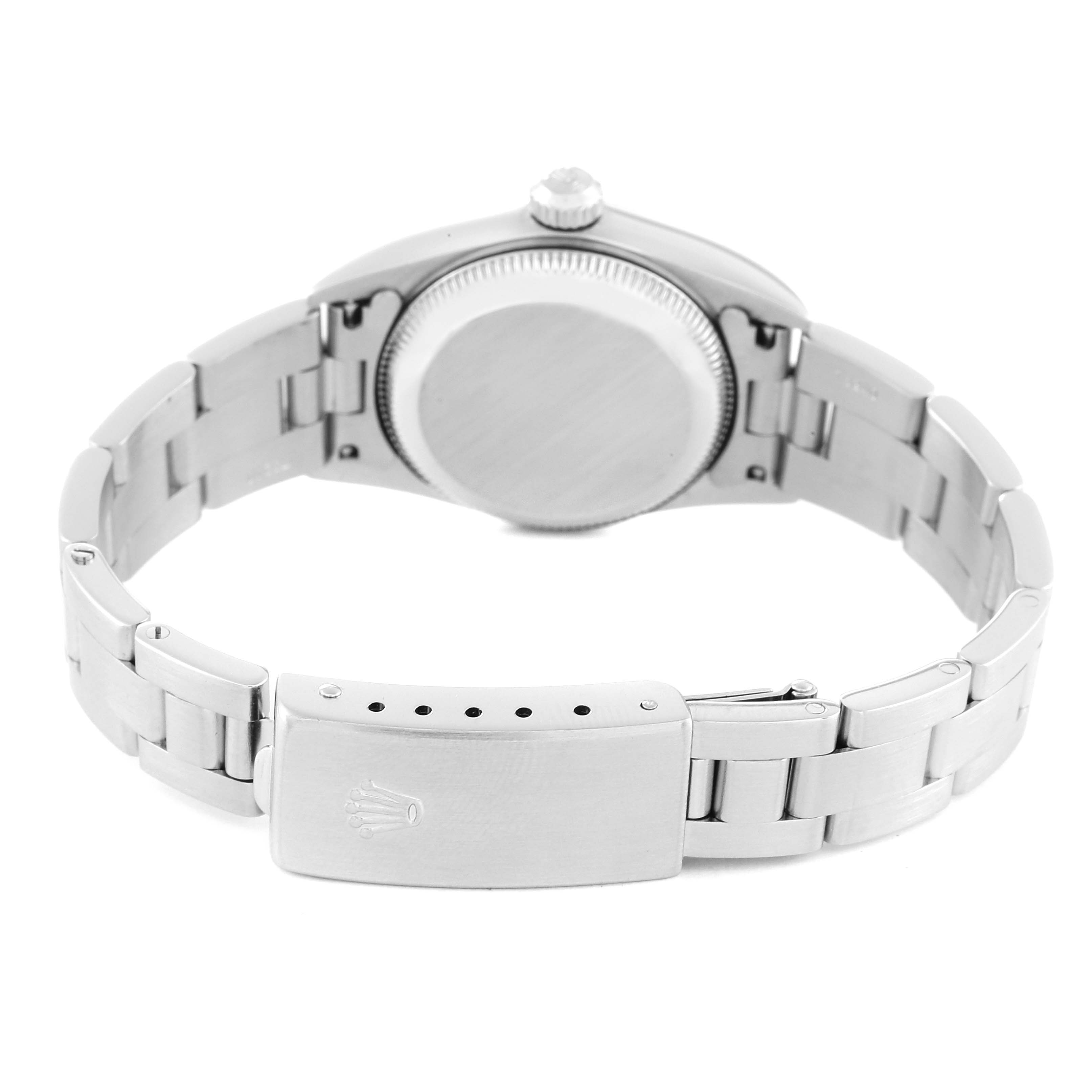 The image shows the back view of a Rolex Oyster Perpetual 76094 Women's Stainless Steel Black Dial 76094 Women's Stainless Steel Black Dial watch, highlighting its clasp and bracelet.