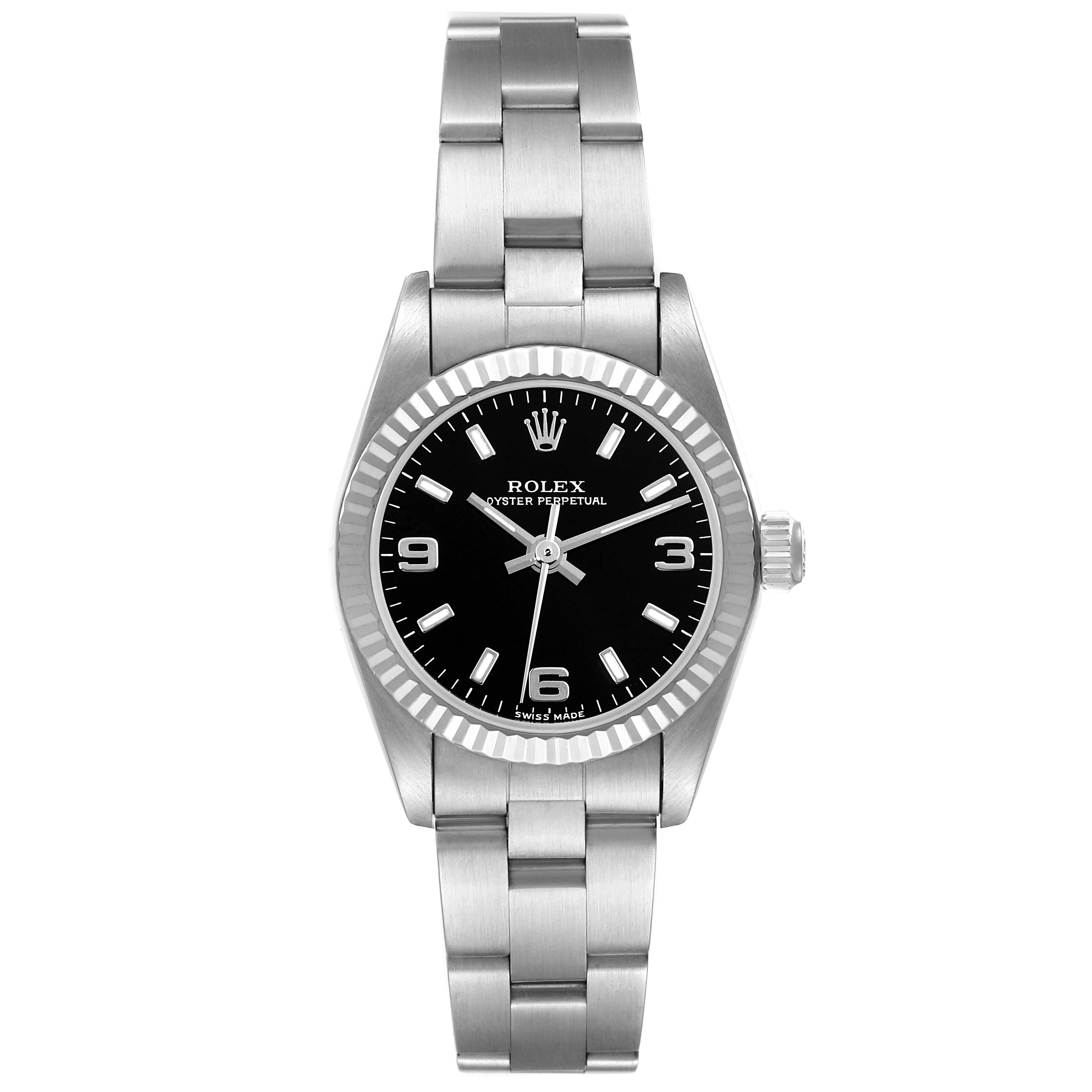 The image shows a front view of a Rolex Oyster Perpetual 76094 Women's Stainless Steel Black Dial 76094 Women's Stainless Steel Black Dial watch, displaying its face, bezel, and bracelet.
