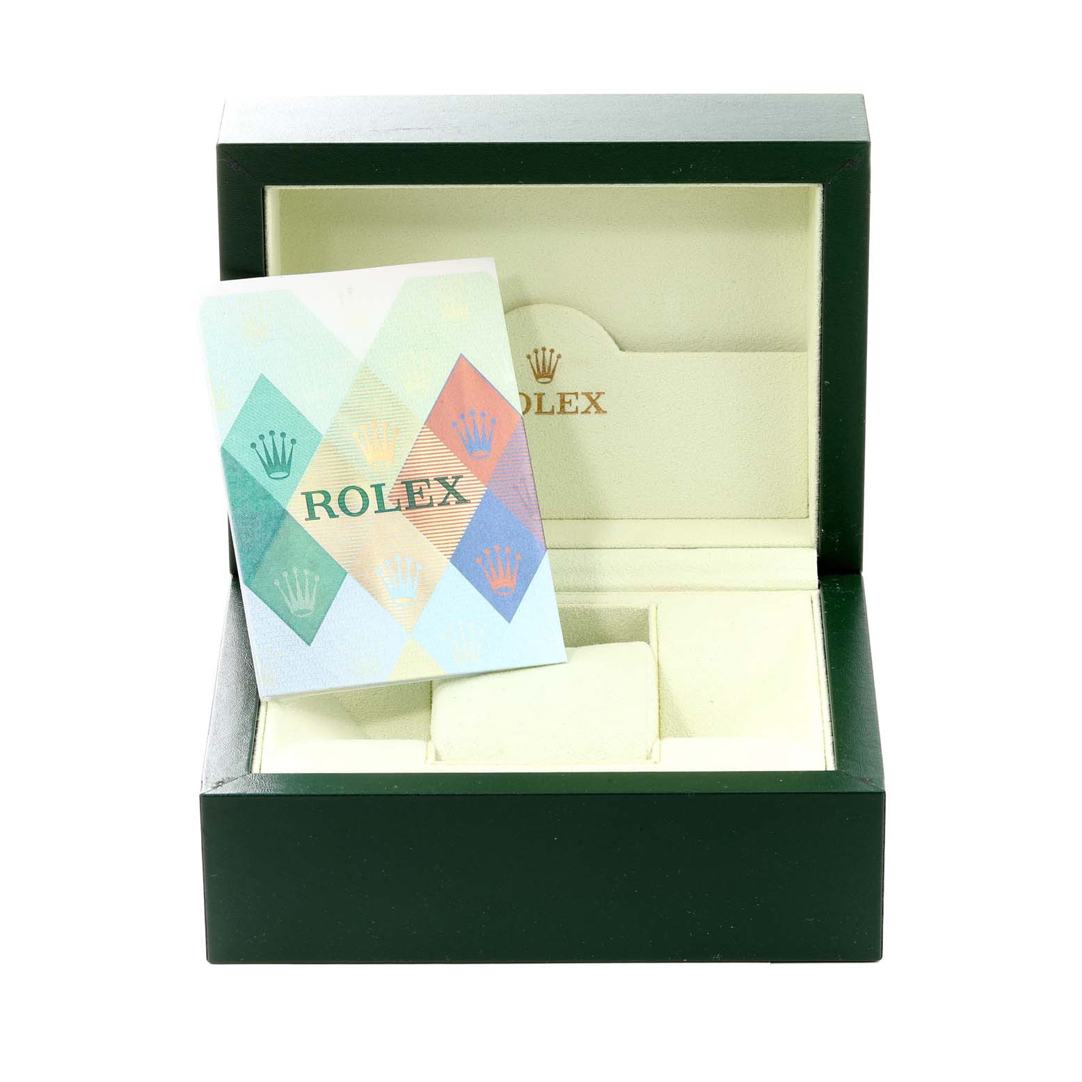 The image shows an open Rolex box for the Oyster Perpetual model, with a pamphlet inside.