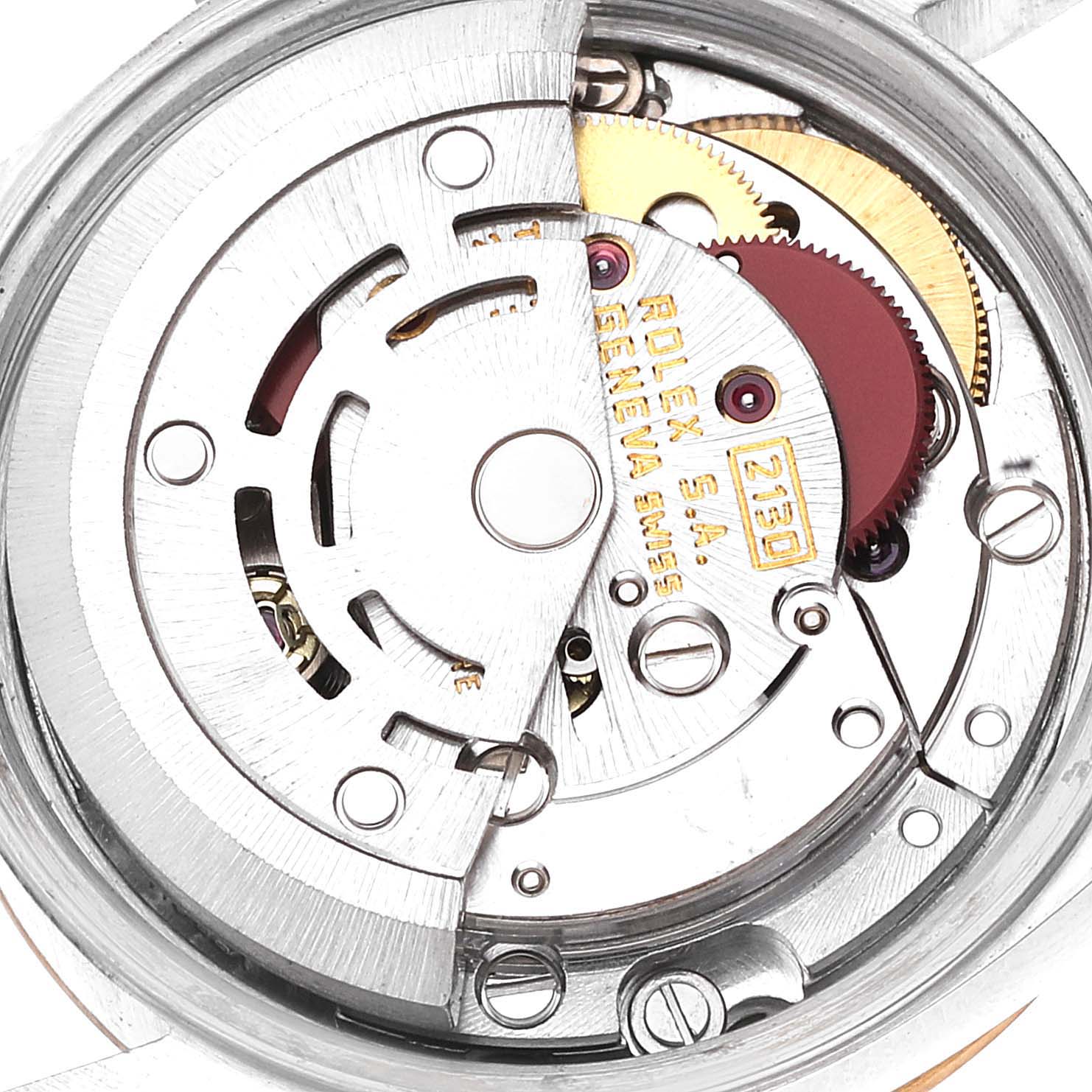 This image shows a close-up view of the inner mechanism of a Rolex Oyster Perpetual 67193 Women's Steel and Gold (two tone) Champagne Dial 67193 Women's Steel and Gold (two tone) Champagne Dial watch.