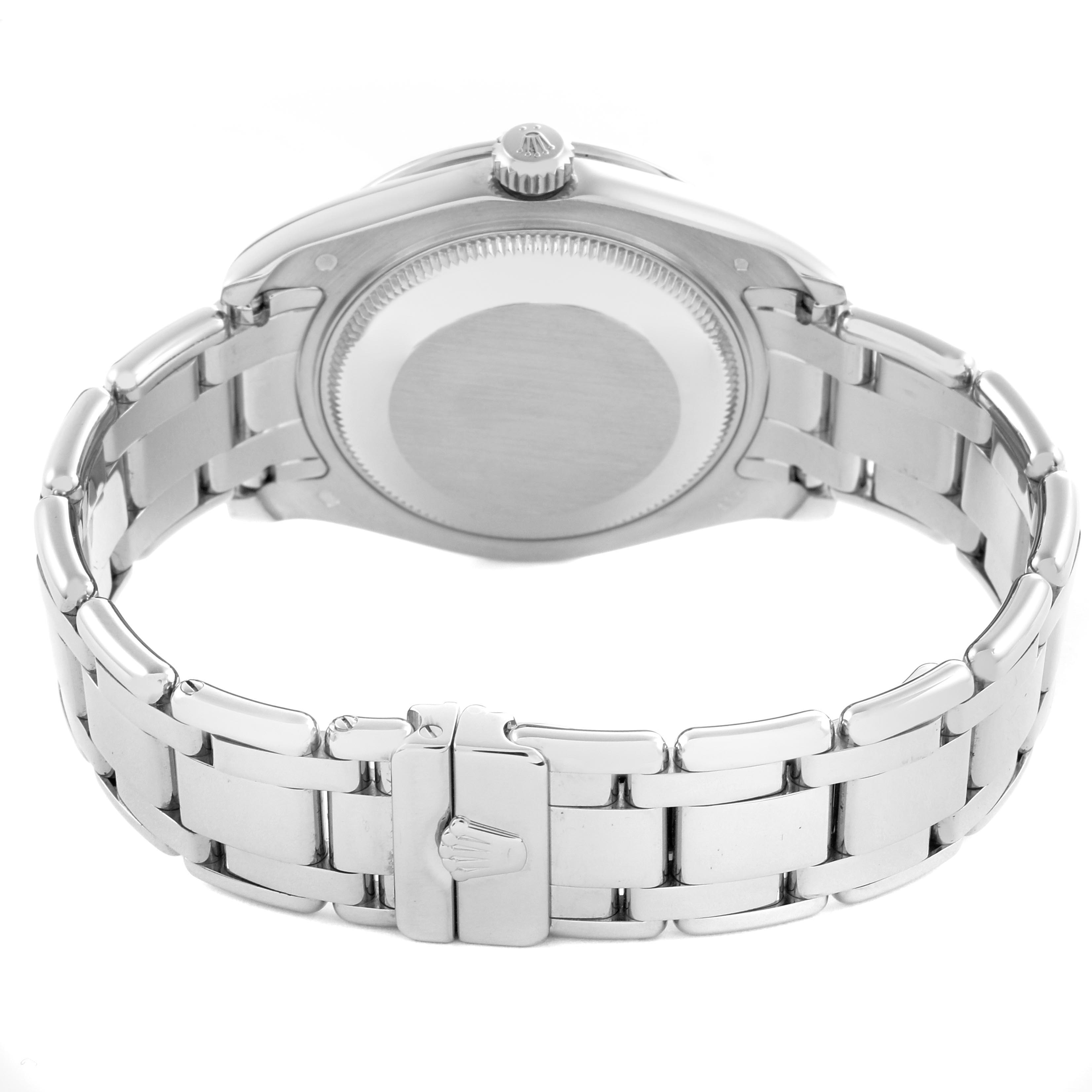 The image shows the back view of a Rolex Pearlmaster 81319 Women
s White Gold White Dial 81319 Women
s White Gold White Dial, highlighting its case back, crown, and bracelet clasp.