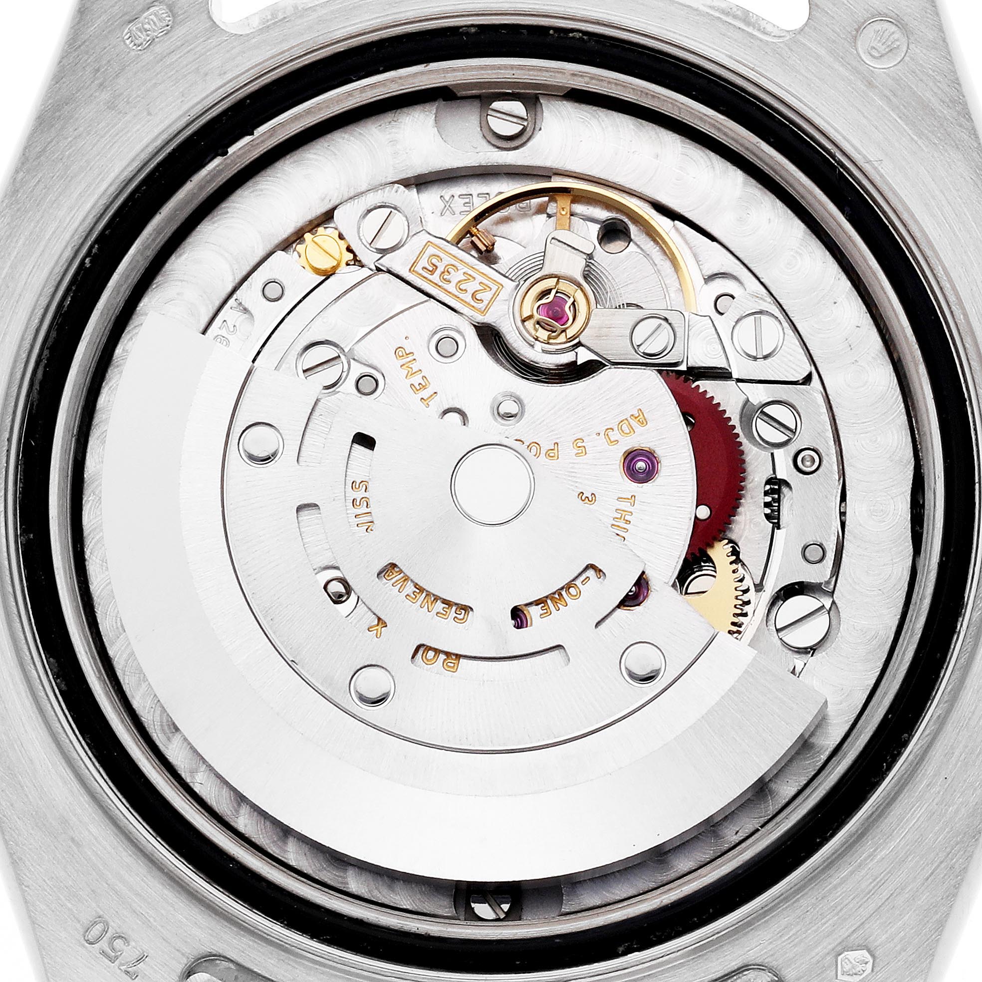 The image shows the back view of a Rolex Pearlmaster 81319 Women
s White Gold White Dial 81319 Women
s White Gold White Dial watch, focusing on its intricate movement components.