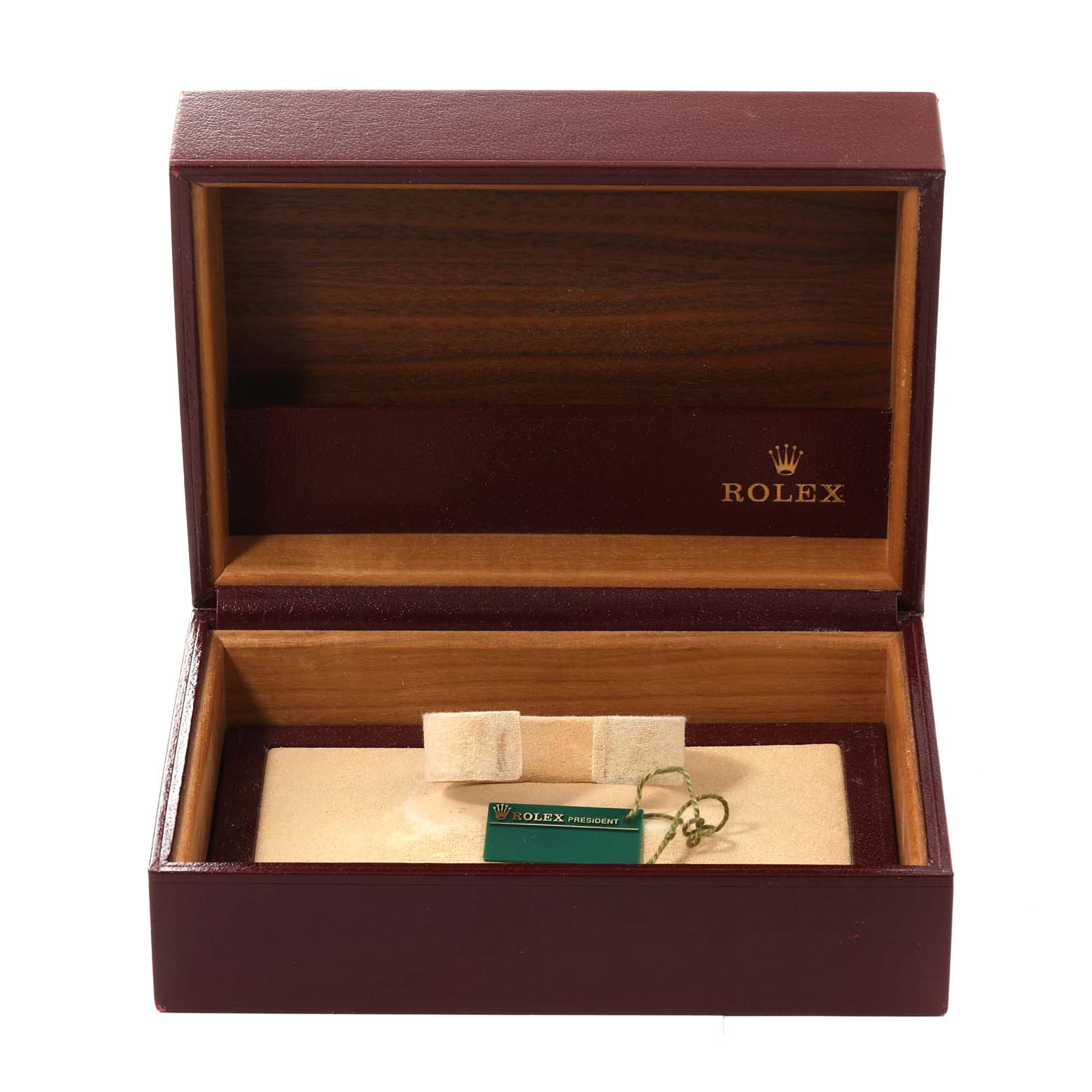 This image shows an open Rolex President 68278 Women's Yellow Gold Champagne Dial 68278 Women's Yellow Gold Champagne Dial watch box with a cushion insert and a Rolex President 68278 Women's Yellow Gold Champagne Dial 68278 Women's Yellow Gold Champagne Dial tag inside.
