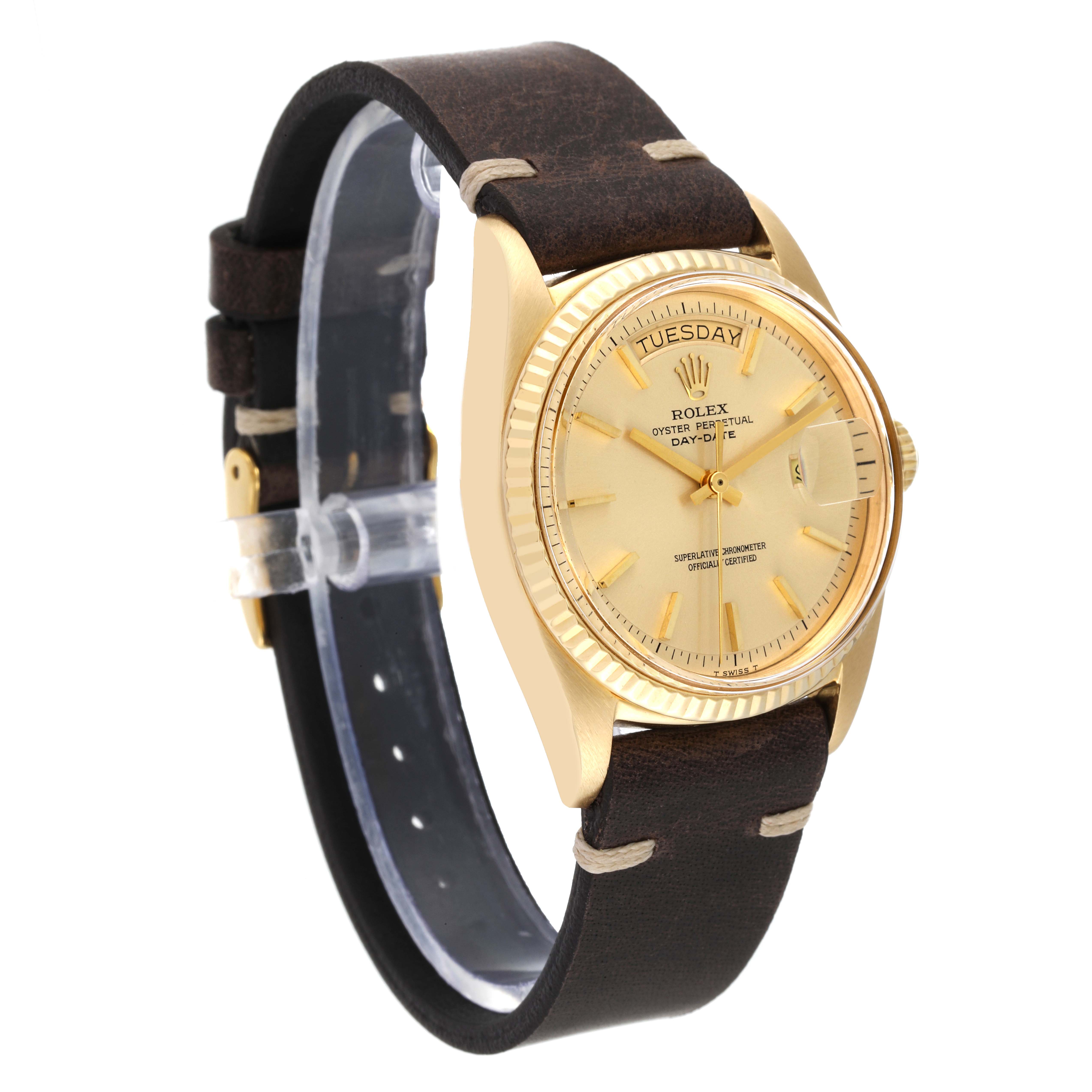 This image showcases the Rolex Vintage Collection 1803 Men's Yellow Gold Champagne Dial 1803 Men's Yellow Gold Champagne Dial model from a three-quarter front angle, highlighting the dial, bezel, and leather strap.