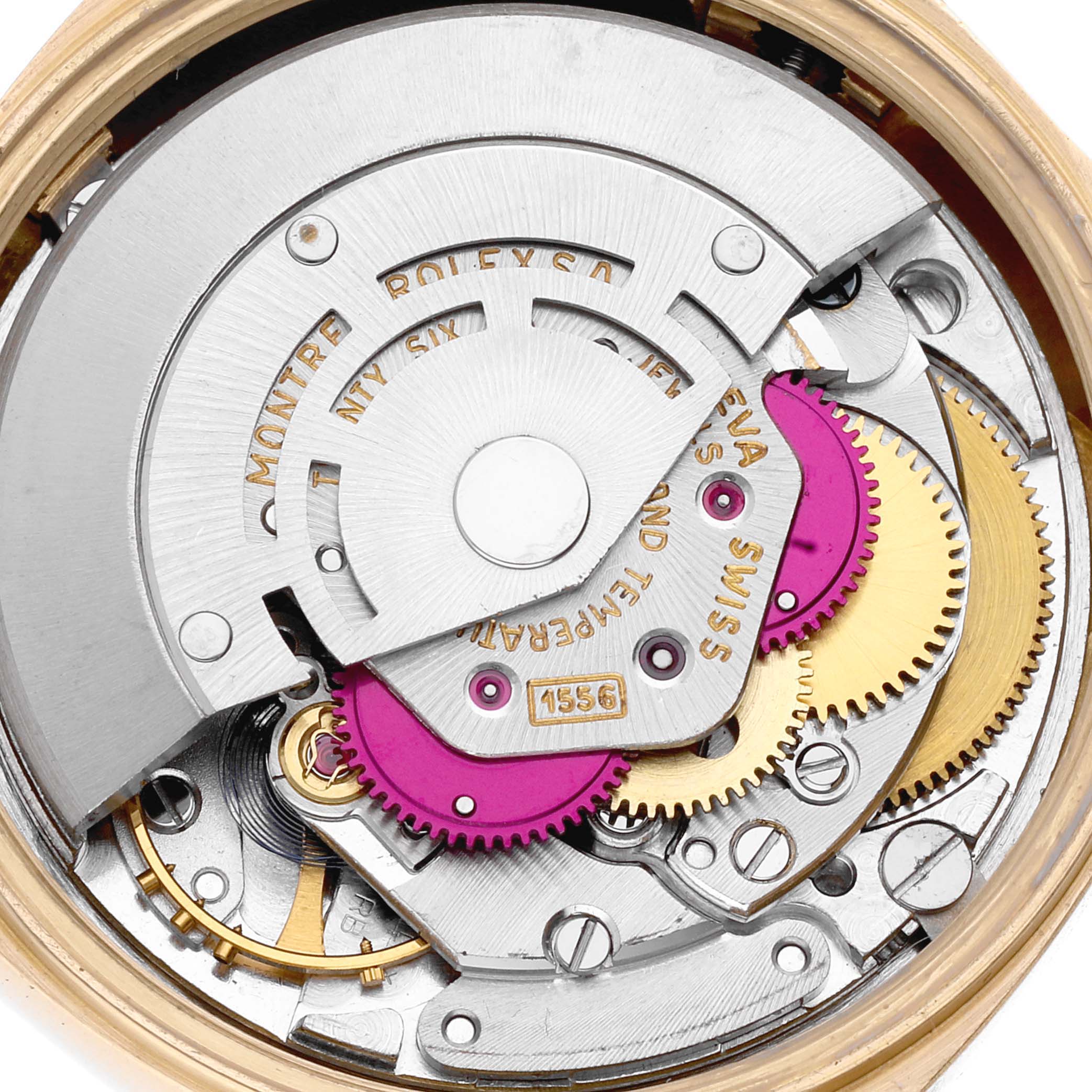 The image shows the intricate internal mechanics of a Vintage Collection Rolex watch, viewed from the back.