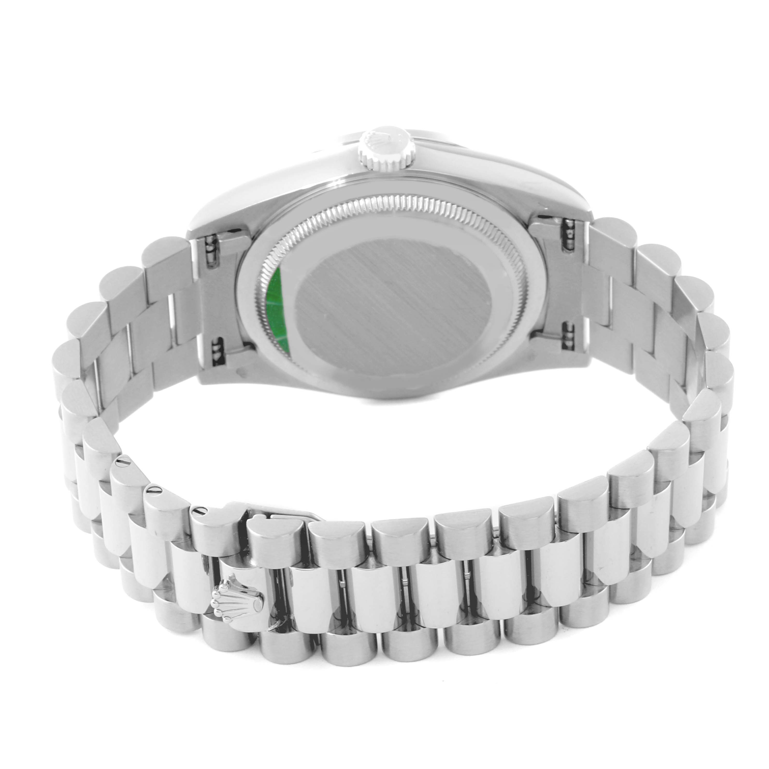 The image shows the back view of a Rolex President 18389MG Men's White Gold Silver Dial 18389MG Men's White Gold Silver Dial model watch, highlighting its bracelet and case back.