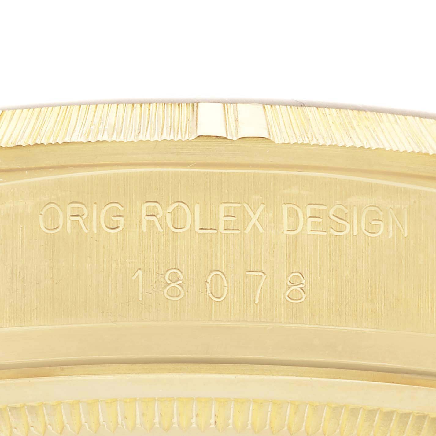 The image shows the engraved side of a Rolex President 18078 Men's Yellow Gold Champagne Dial 18078 Men's Yellow Gold Champagne Dial watch, highlighting "ORIG ROLEX DESIGN" and the model number.