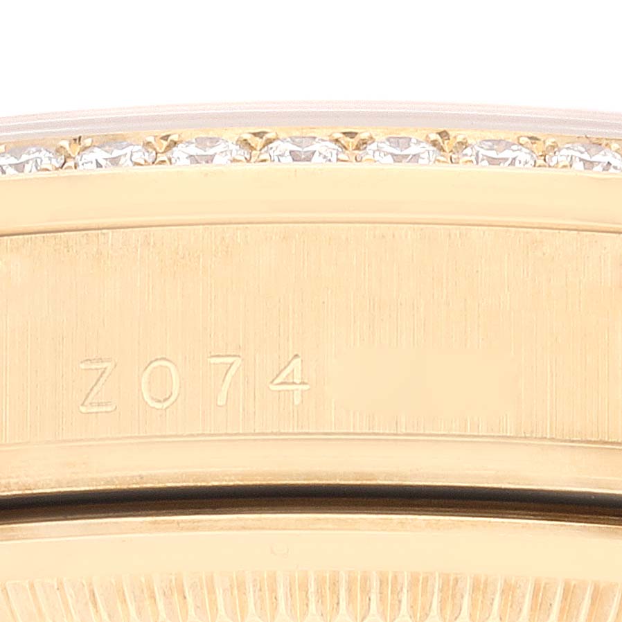 The image shows a detailed side view of the bezel and a portion of the case of a Rolex President 118348 Men's Yellow Gold Green Dial model watch.
