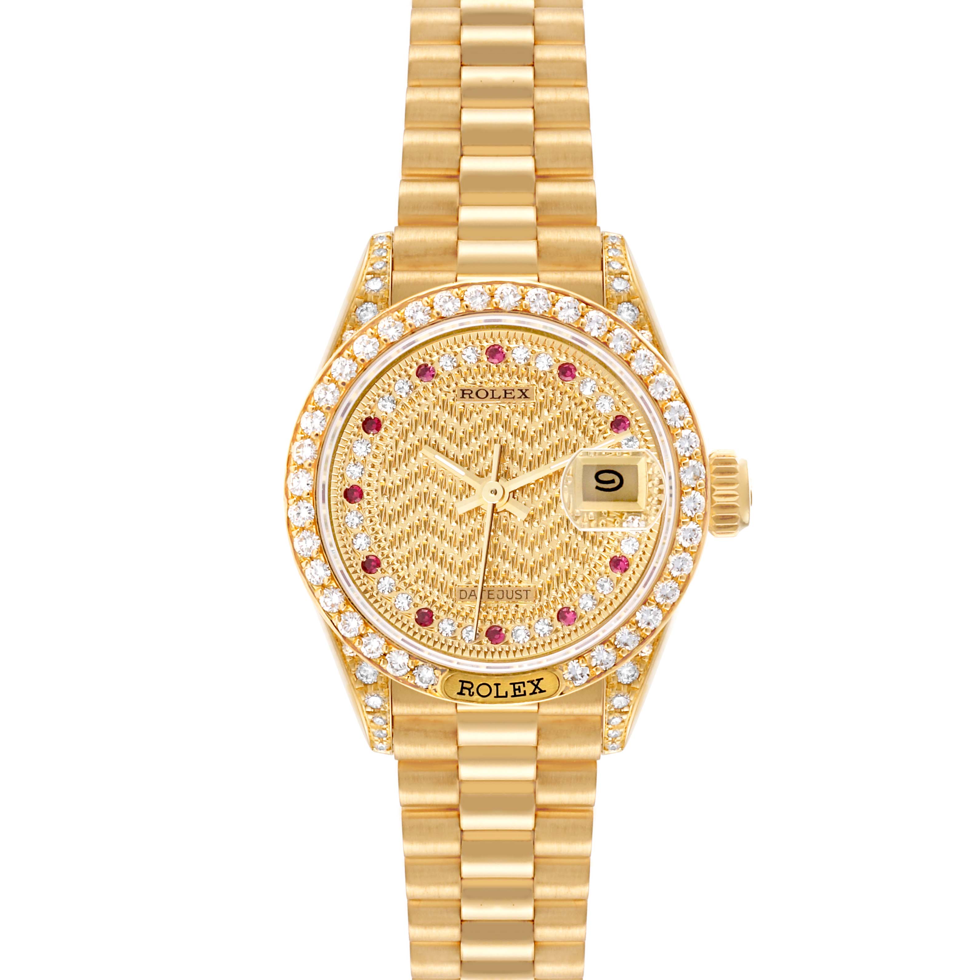 The image shows a top-down view of a Rolex President 69158 Women's Yellow Gold Champagne Dial 69158 Women's Yellow Gold Champagne Dial model watch, highlighting its gold case, diamond bezel, and dial with ruby hour markers.