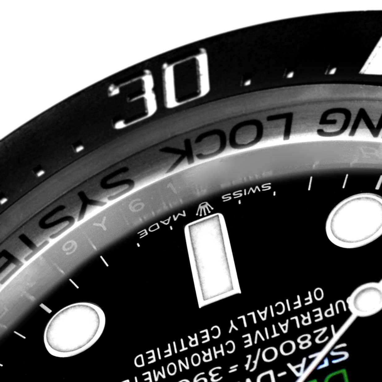 The image shows a close-up of the bezel and part of the dial of a Rolex Sea-Dweller 136660 Men's Stainless Steel Blue Dial 136660 Men's Stainless Steel Blue Dial, highlighting the "30" mark and text.