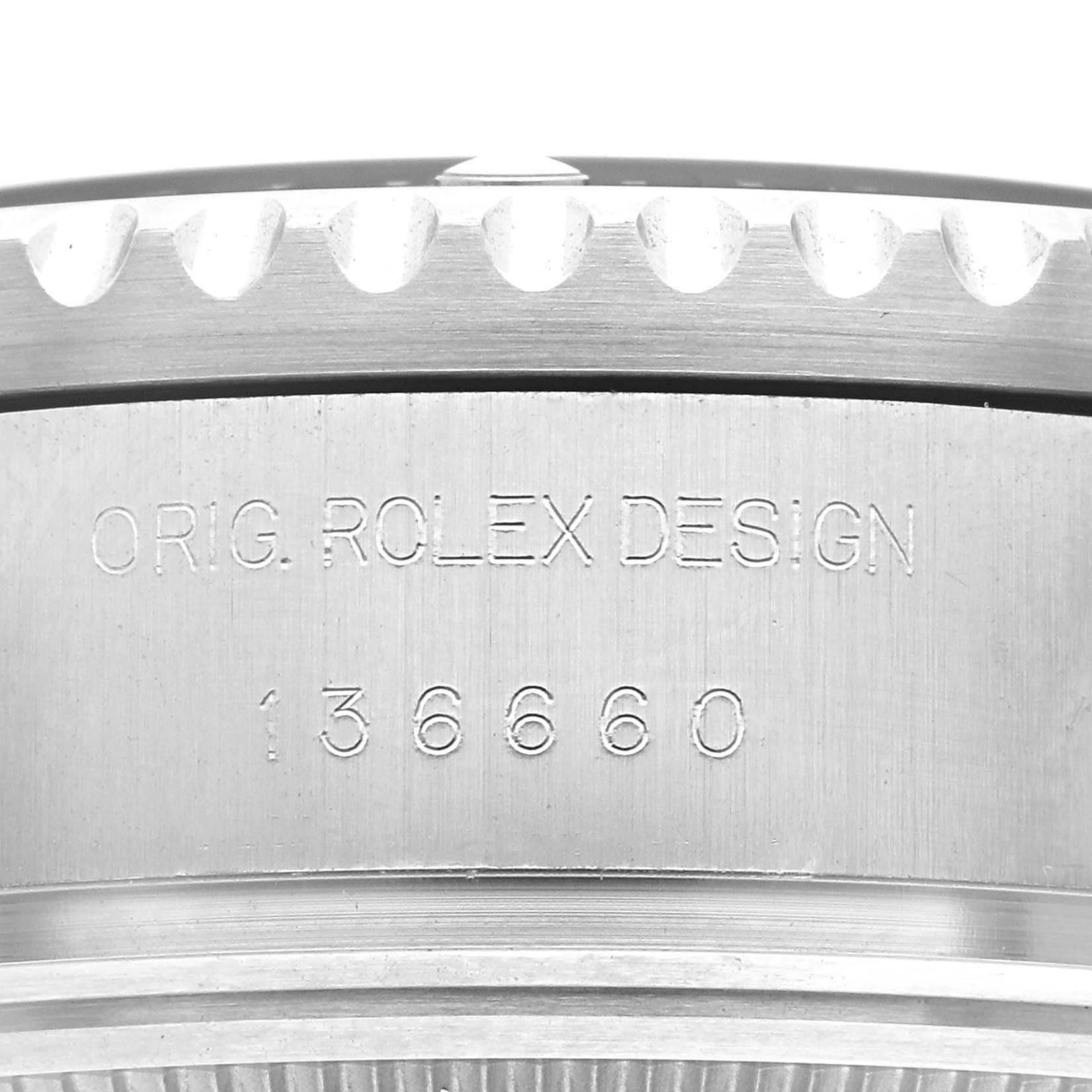 The image shows the side of a Rolex Sea-Dweller 136660 Men's Stainless Steel Blue Dial 136660 Men's Stainless Steel Blue Dial, highlighting the engraved "ORIG. ROLEX DESIGN" and model number.