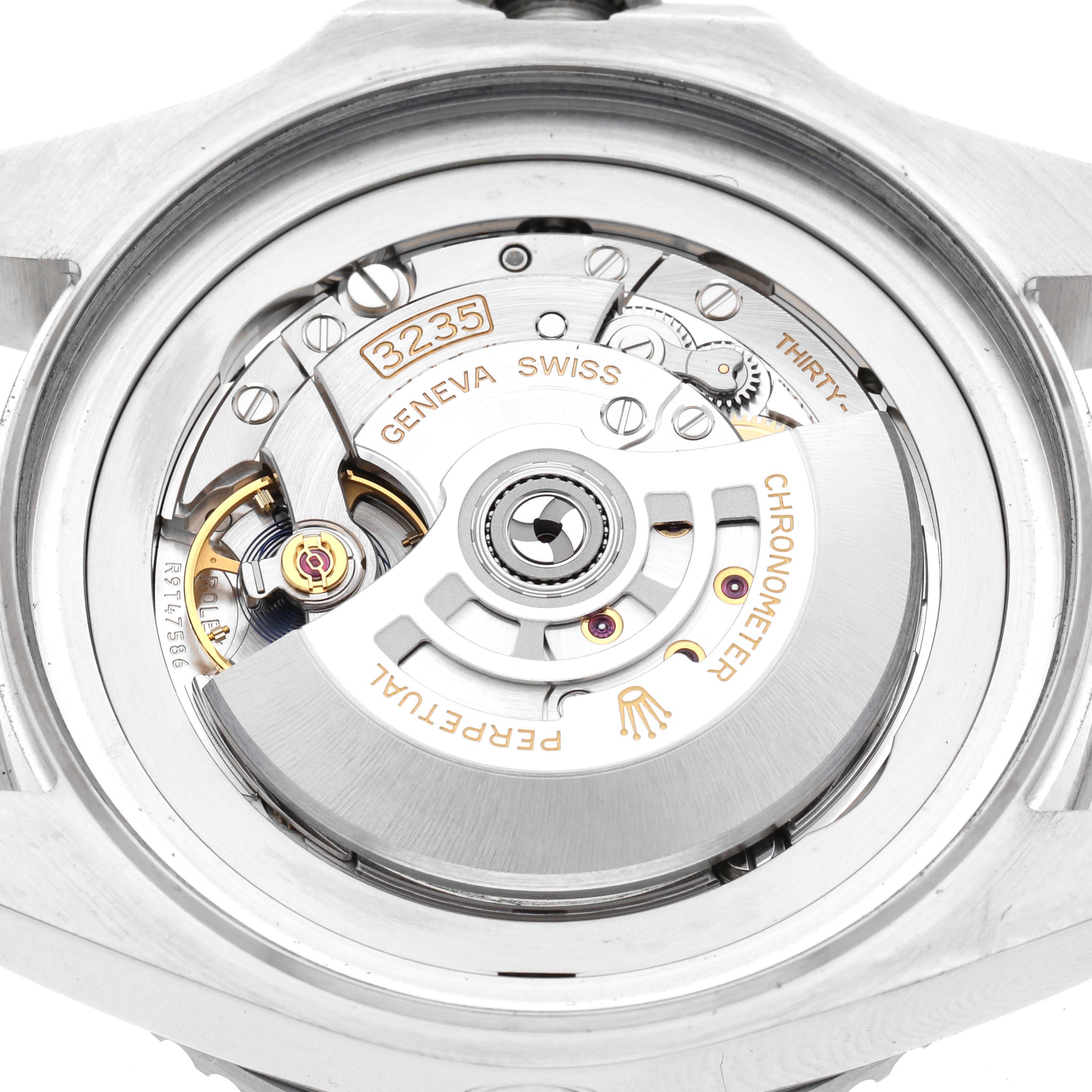 The image shows the open caseback of a Rolex Sea-Dweller 136660 Men's Stainless Steel Blue Dial 136660 Men's Stainless Steel Blue Dial, highlighting the movement and rotor from a top-down angle.