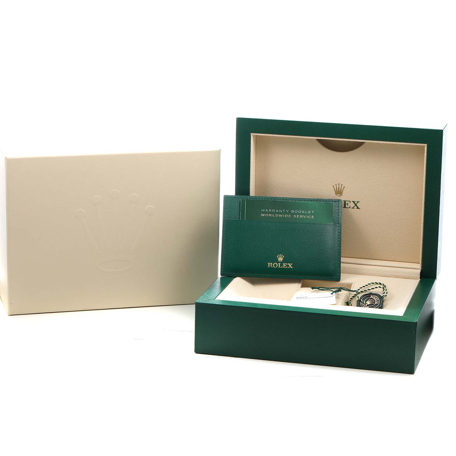 The image shows the packaging and accessories of a Rolex Sky-Dweller 326934 Men's Stainless Steel Black Dial watch, including a box, booklet, and tag, viewed from the front.