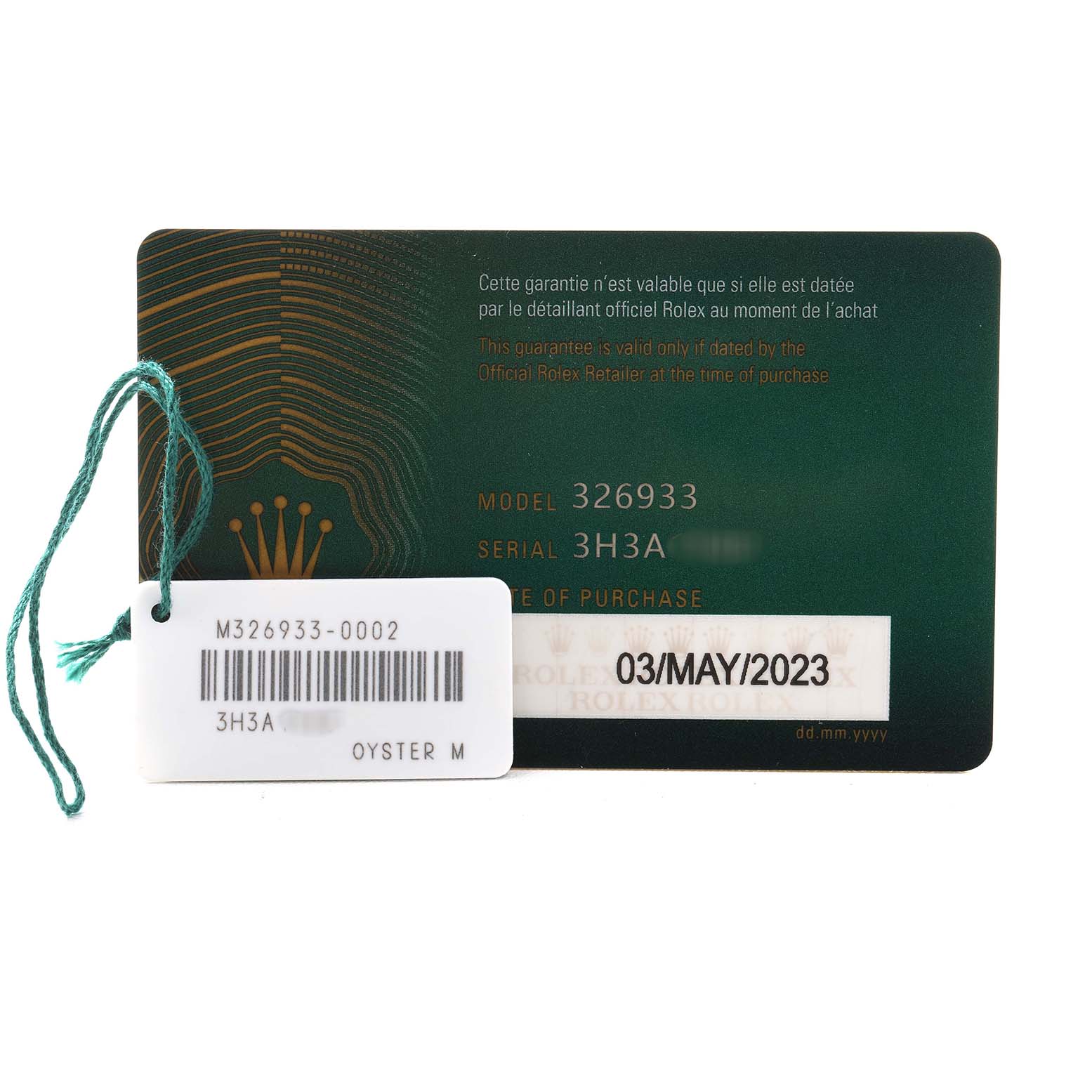 The image shows a warranty card and tag for a Rolex Sky-Dweller 326933 Men's Steel and Gold (two tone) Black Dial, model 326933, with purchase date and serial details visible.