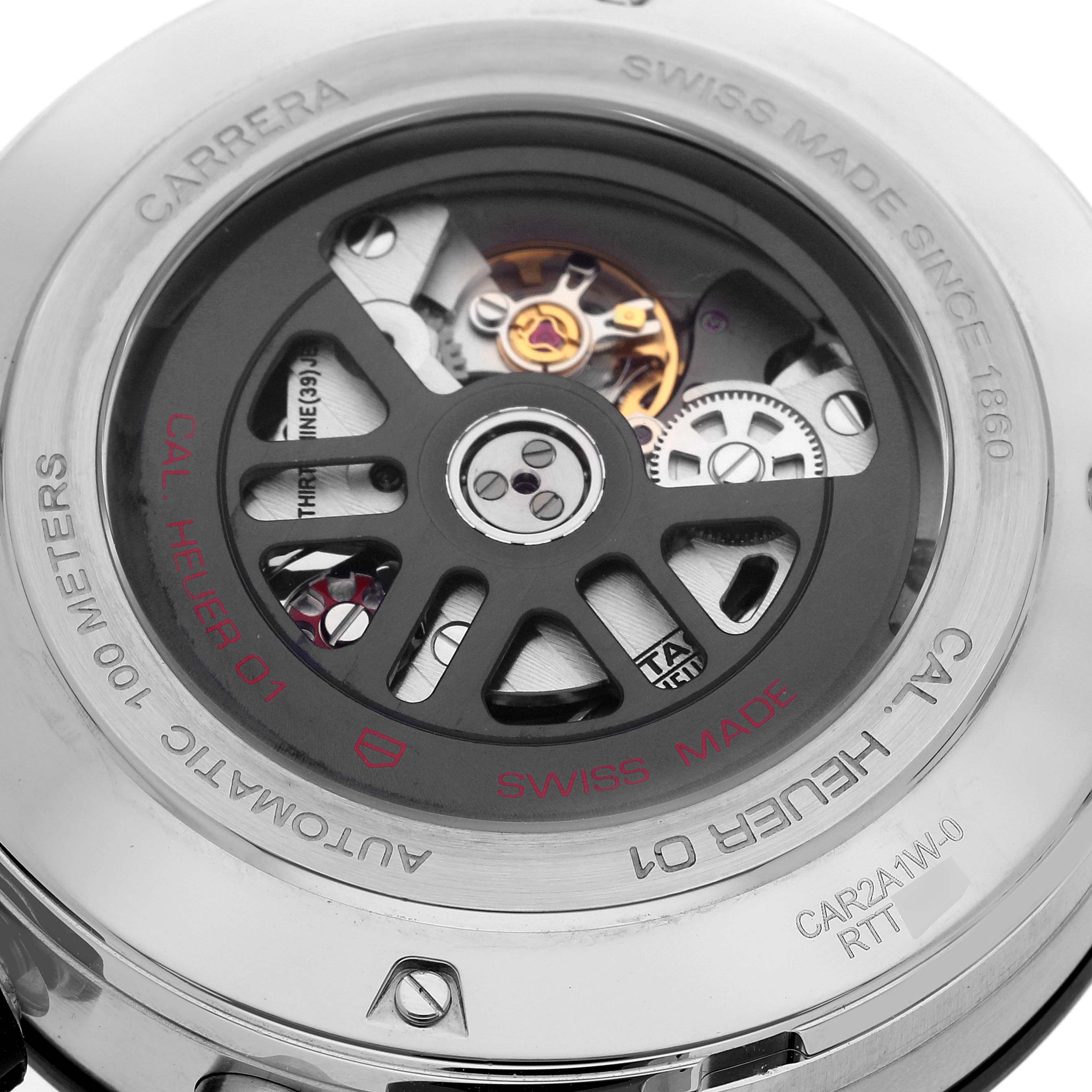 The image shows the back of the Carrera model by Tag Heuer, highlighting its automatic movement and inner mechanics.