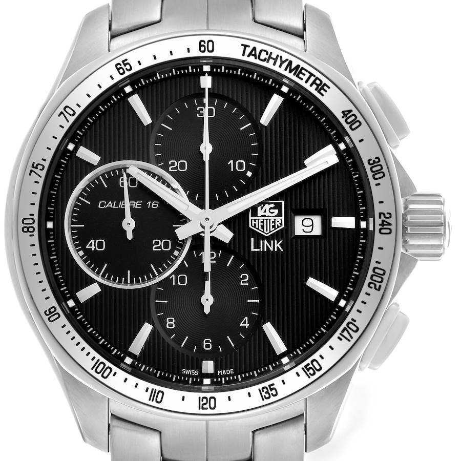 The Tag Heuer Link watch is shown from a front angle, displaying its face, tachymeter bezel, and side buttons.