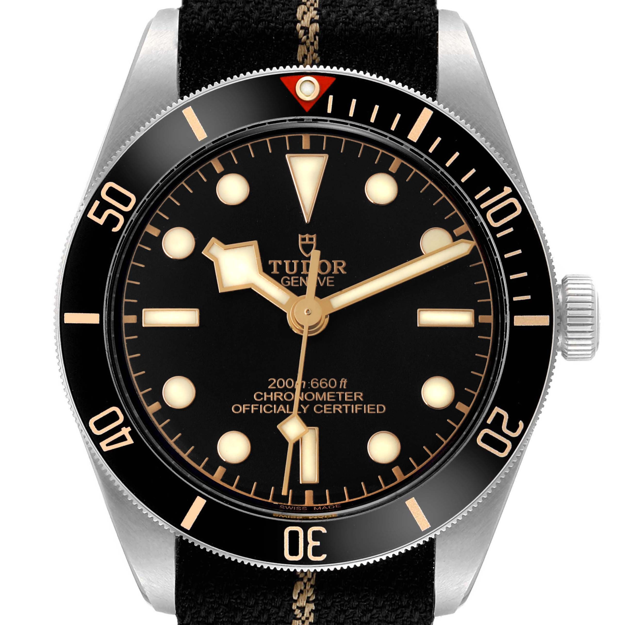 The image shows a frontal view of the Tudor Heritage Black Bay 79030 Men's Stainless Steel Black Dial watch, highlighting its dial, bezel, and crown.