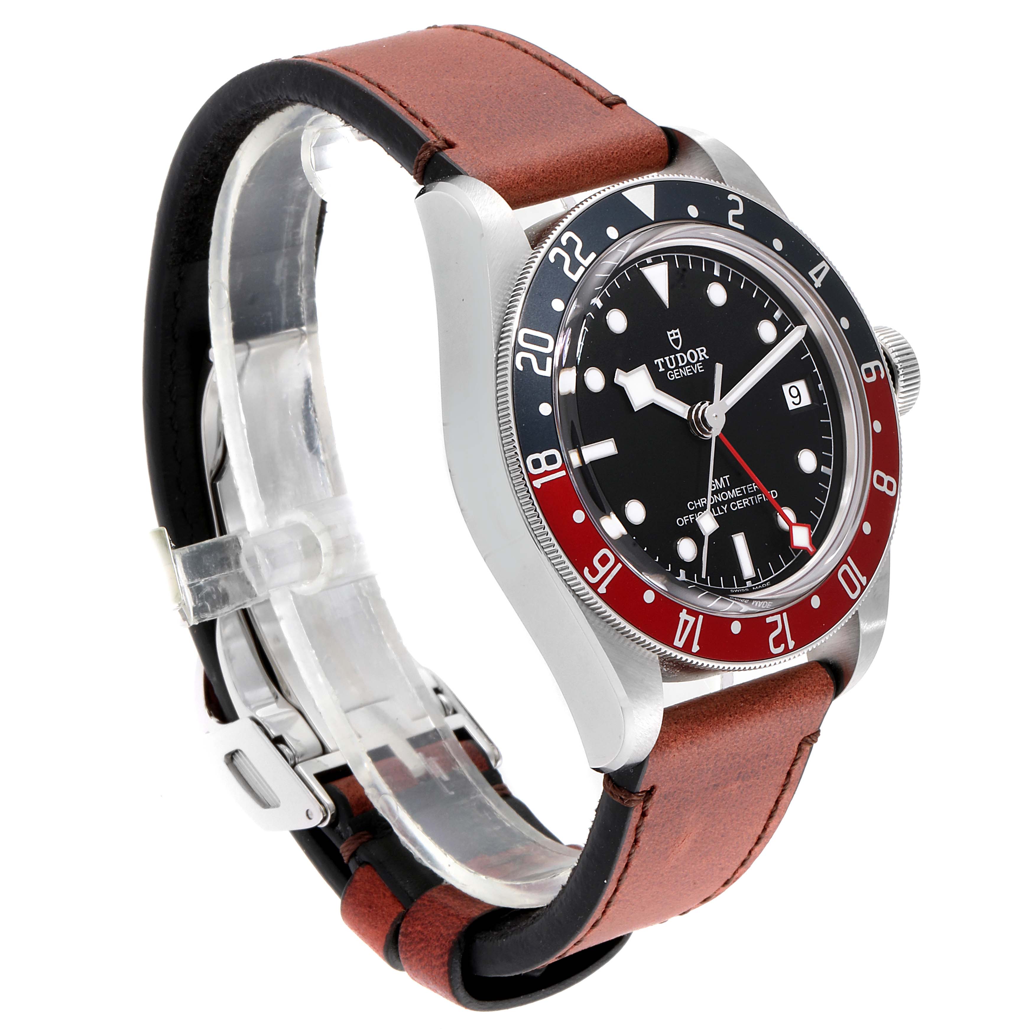 The image shows a Tudor Heritage Black Bay 79830RB Men
s Stainless Steel Black Dial 79830RB Men
s Stainless Steel Black Dial watch from an angle that clearly displays its face, bezel, and brown leather strap.