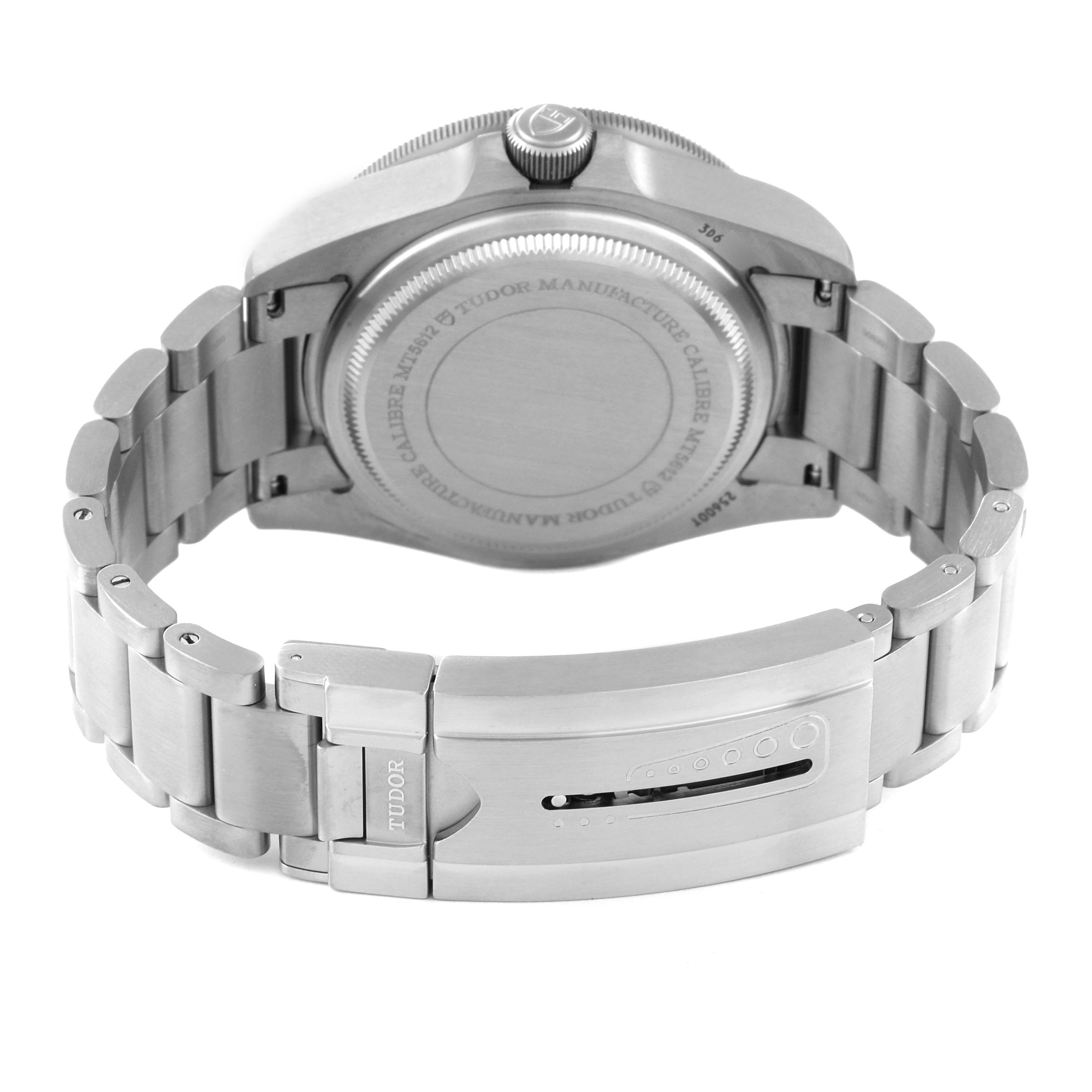 The image shows the back case and bracelet clasp of a Tudor Pelagos M25600TN-0001 Men
s Titanium Black Dial M25600TN-0001 Men
s Titanium Black Dial watch, viewed from the rear.