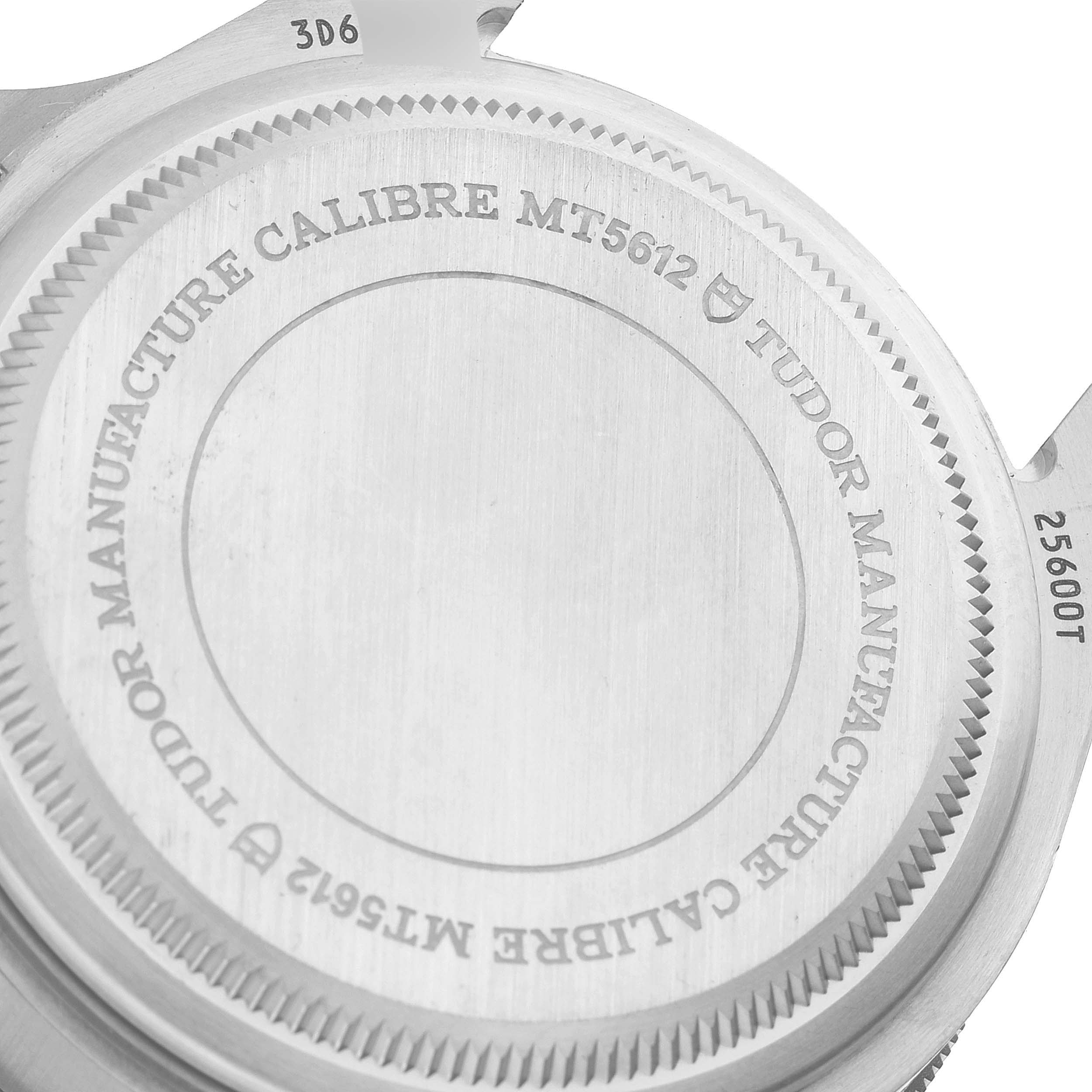 The image shows the back case of a Tudor Pelagos M25600TN-0001 Men
s Titanium Black Dial M25600TN-0001 Men
s Titanium Black Dial watch, showcasing the Tudor Manufacture Calibre MT5612 inscription.