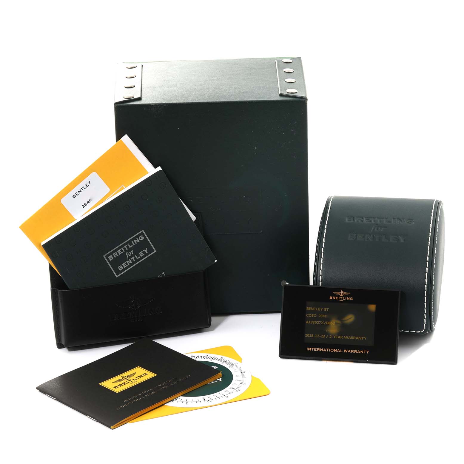 The image shows the packaging and accessories for the Breitling Bentley A13362 Men's Stainless Steel Mother of Pearl Dial A13362 Men's Stainless Steel Mother of Pearl Dial model watch, including manuals, warranty card, and watch case.