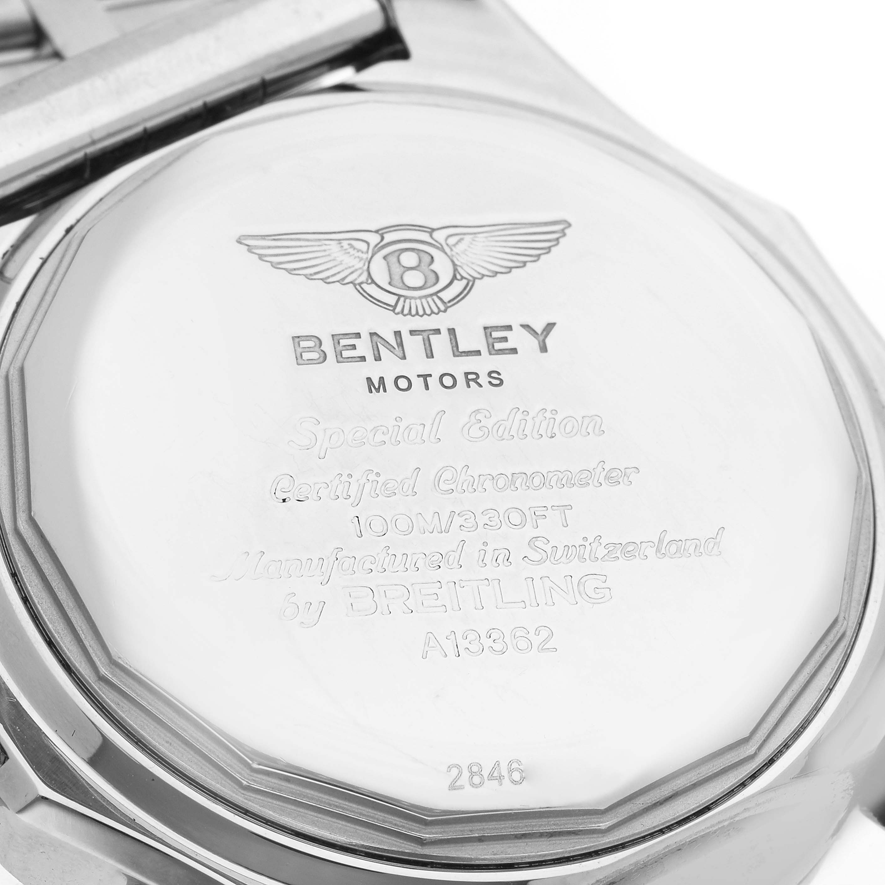 The image shows the back case of a Breitling Bentley A13362 Men's Stainless Steel Mother of Pearl Dial A13362 Men's Stainless Steel Mother of Pearl Dial watch from a top-down angle.