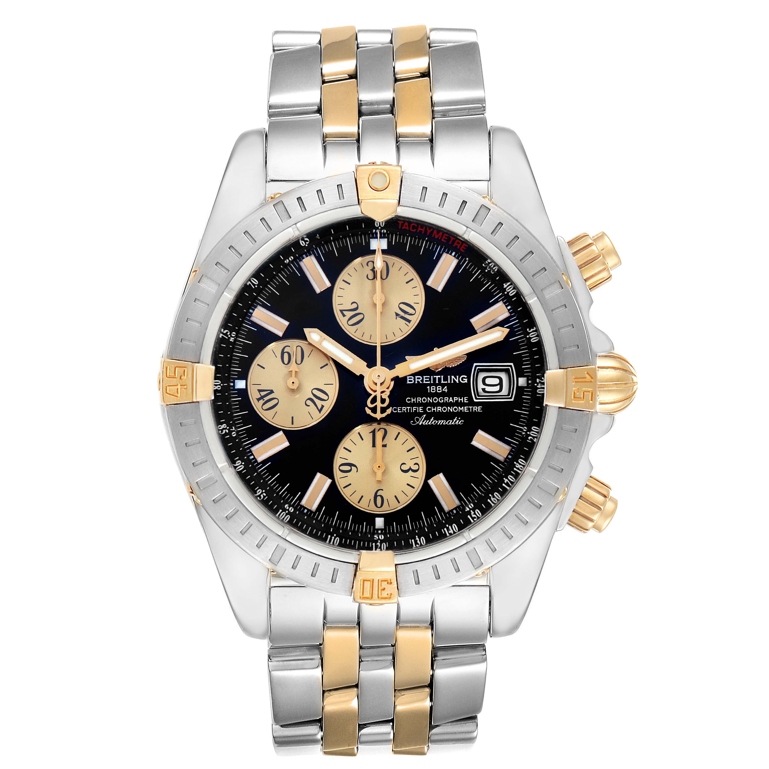 The Breitling Chronomat B13356 Men's Steel and Gold (two tone) Black Dial B13356 Men's Steel and Gold (two tone) Black Dial watch is shown from a front angle, displaying its bezel, dial, subdials, and bracelet.