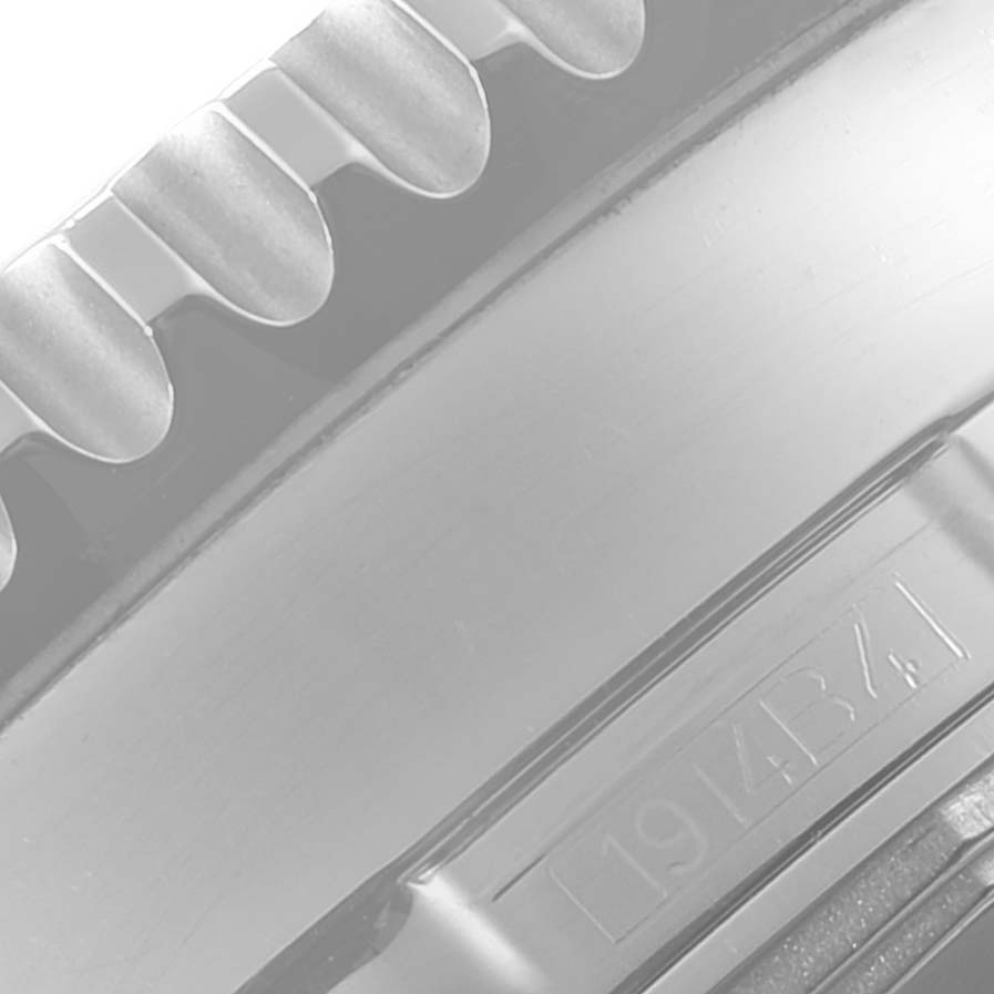 This close-up image shows the bezel and partial case of a Breitling Navitimer A24322 Men's Stainless Steel Black Dial A24322 Men's Stainless Steel Black Dial watch.