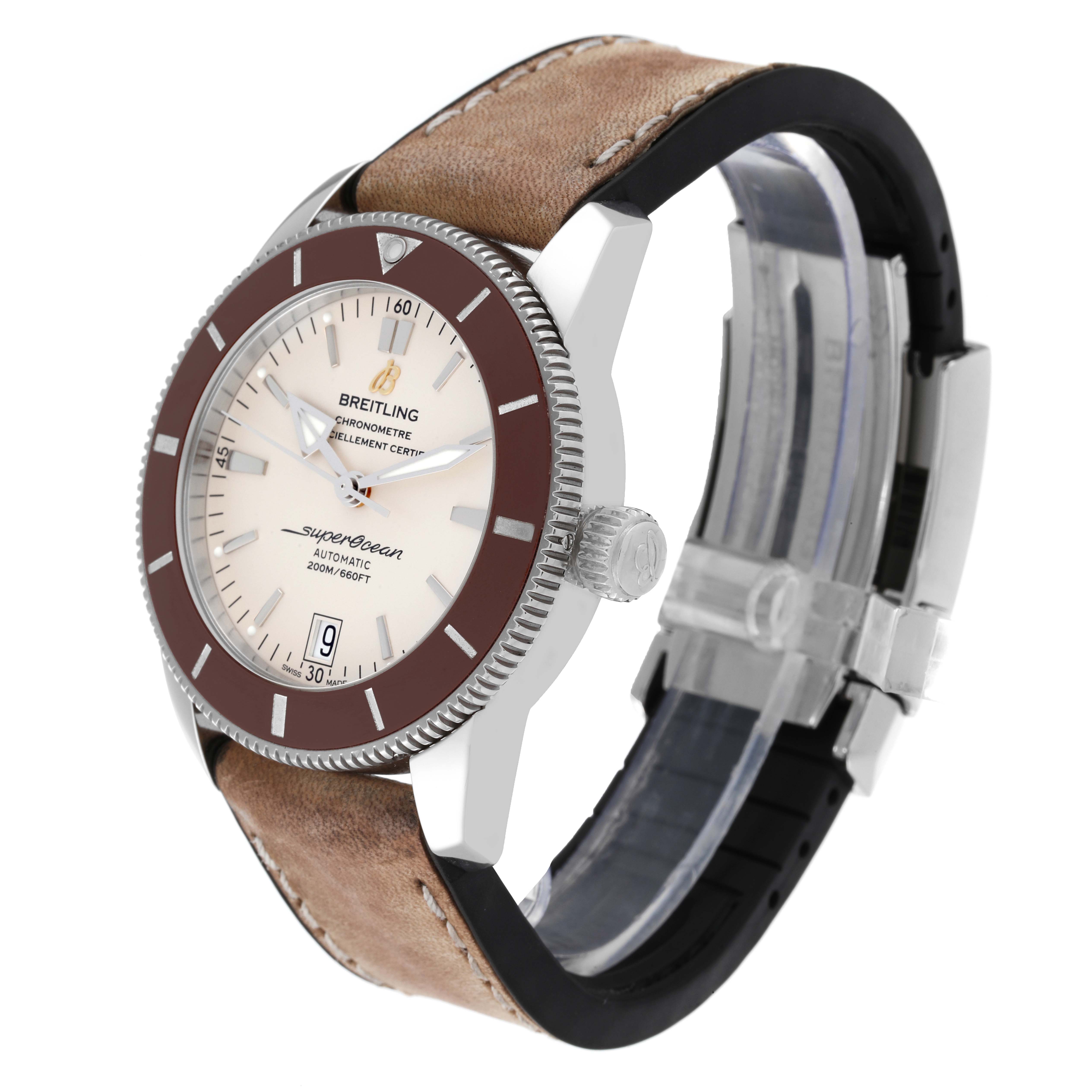 The Breitling Superocean AB2010 Men's Stainless Steel Beige Dial AB2010 Men's Stainless Steel Beige Dial watch is shown at a three-quarter angle, highlighting its face, bezel, crown, and leather strap.