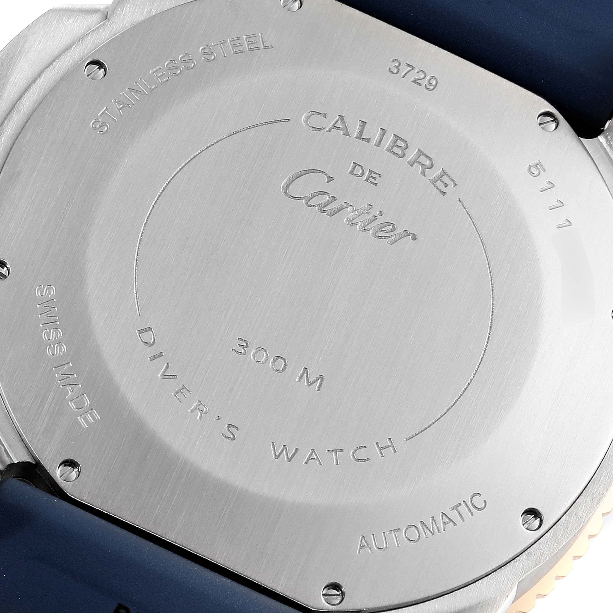 The image shows the back case of a stainless steel Calibre de Cartier model by Cartier, detailing its specifications as a diver's watch.