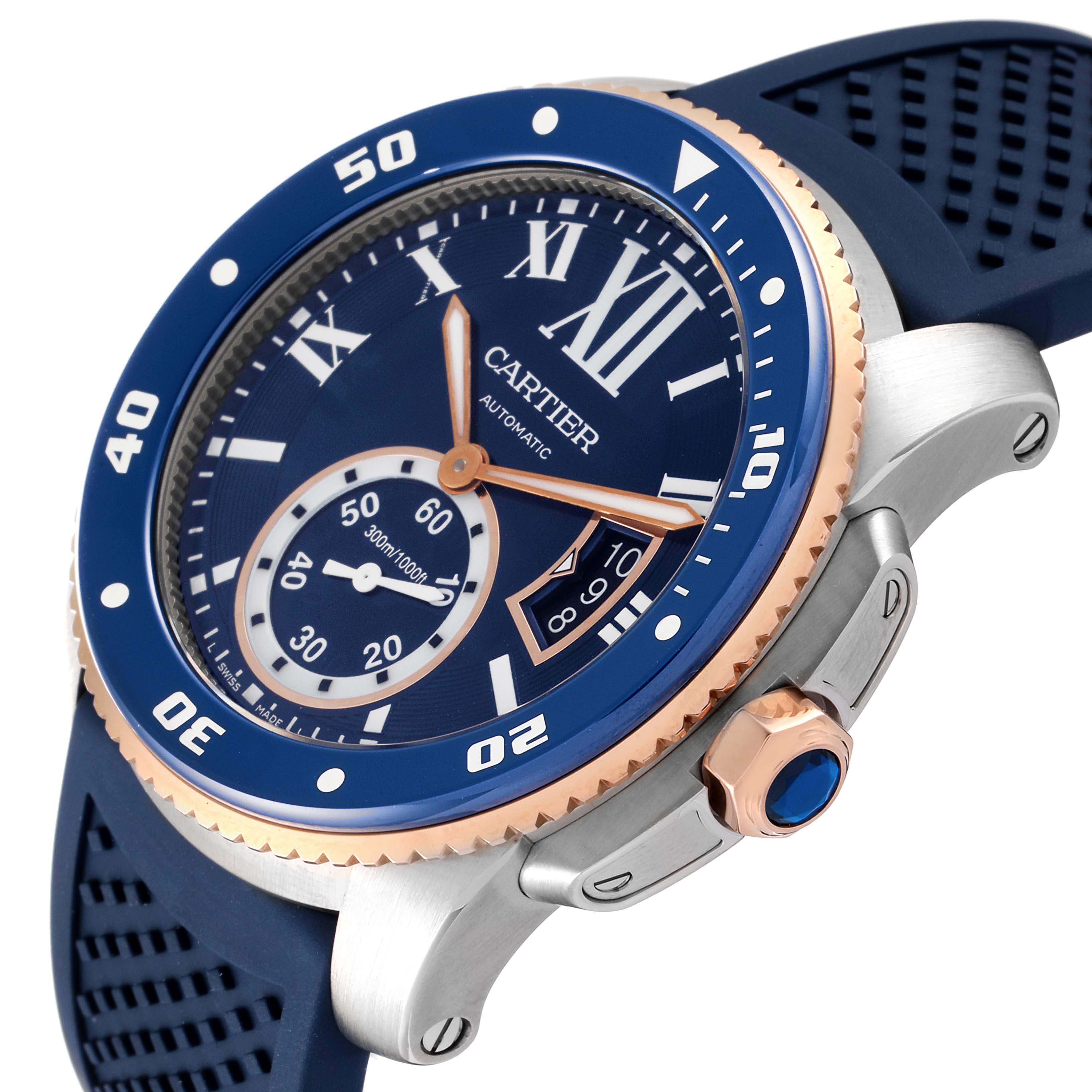 This image shows a Calibre de Cartier watch by Cartier from an angled view, highlighting the blue dial and bezel.