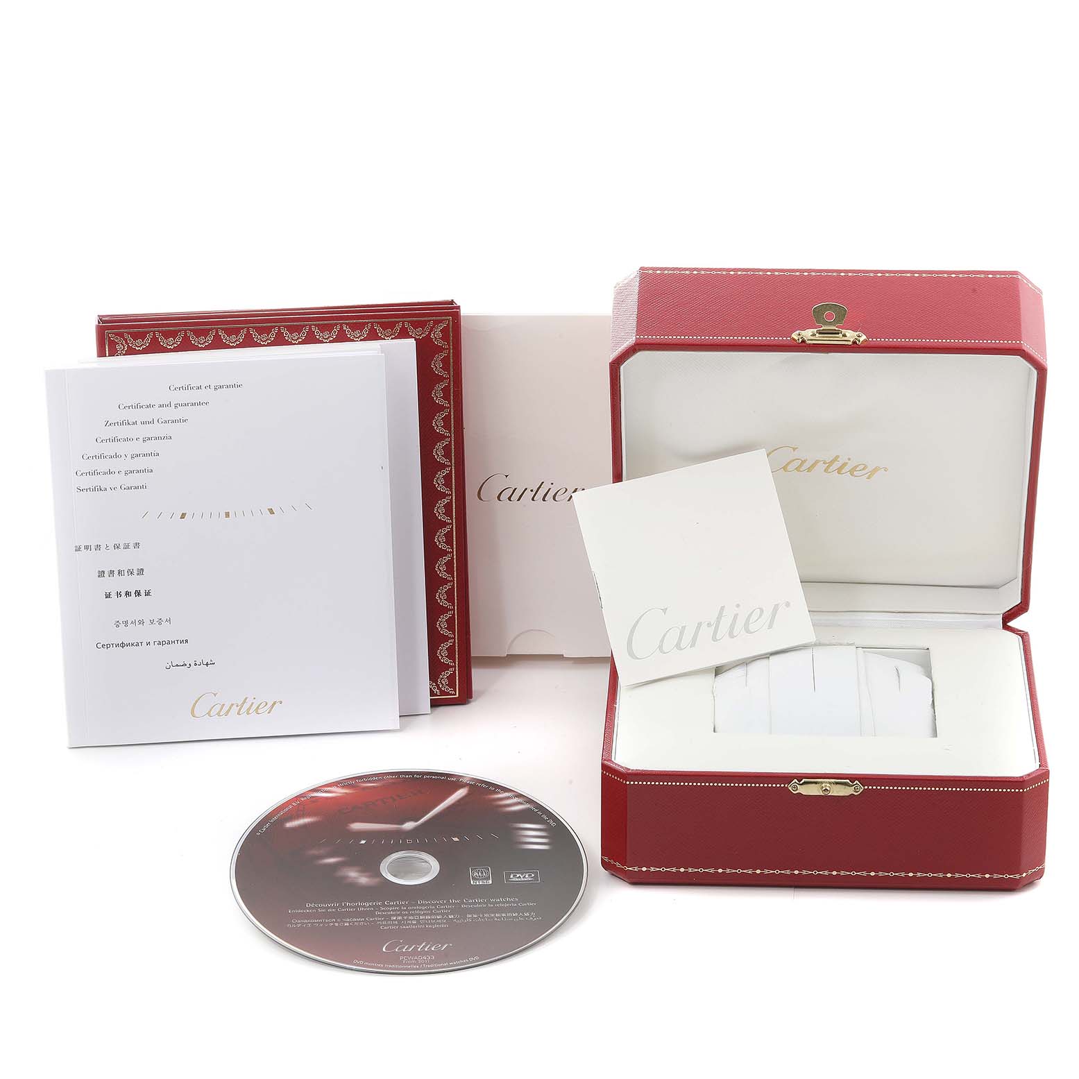 The image shows the accessories of a Ronde model by Cartier, including the box, manuals, and a CD.