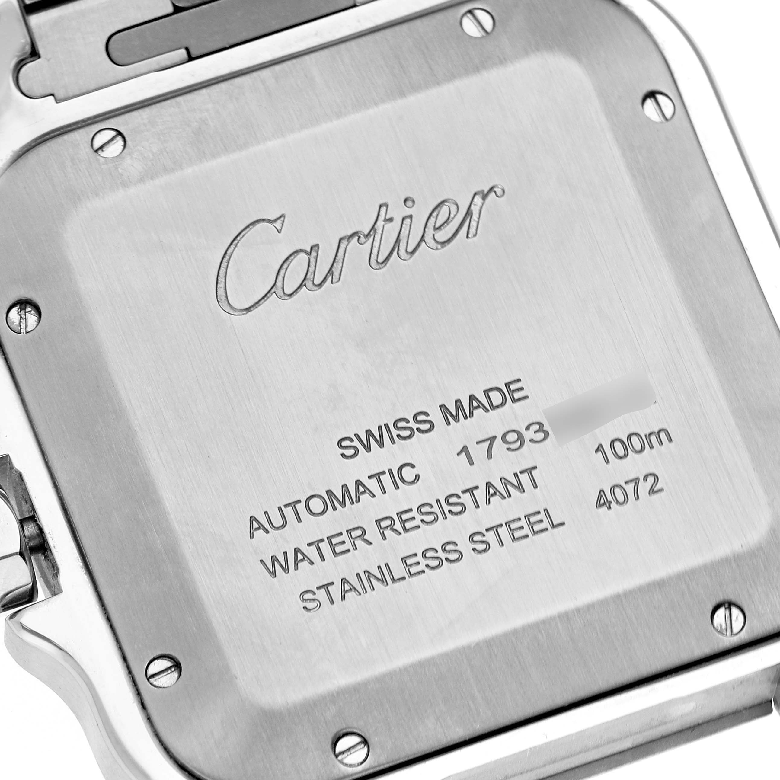 The image shows the back case of a Santos model by Cartier, highlighting engravings of specifications.