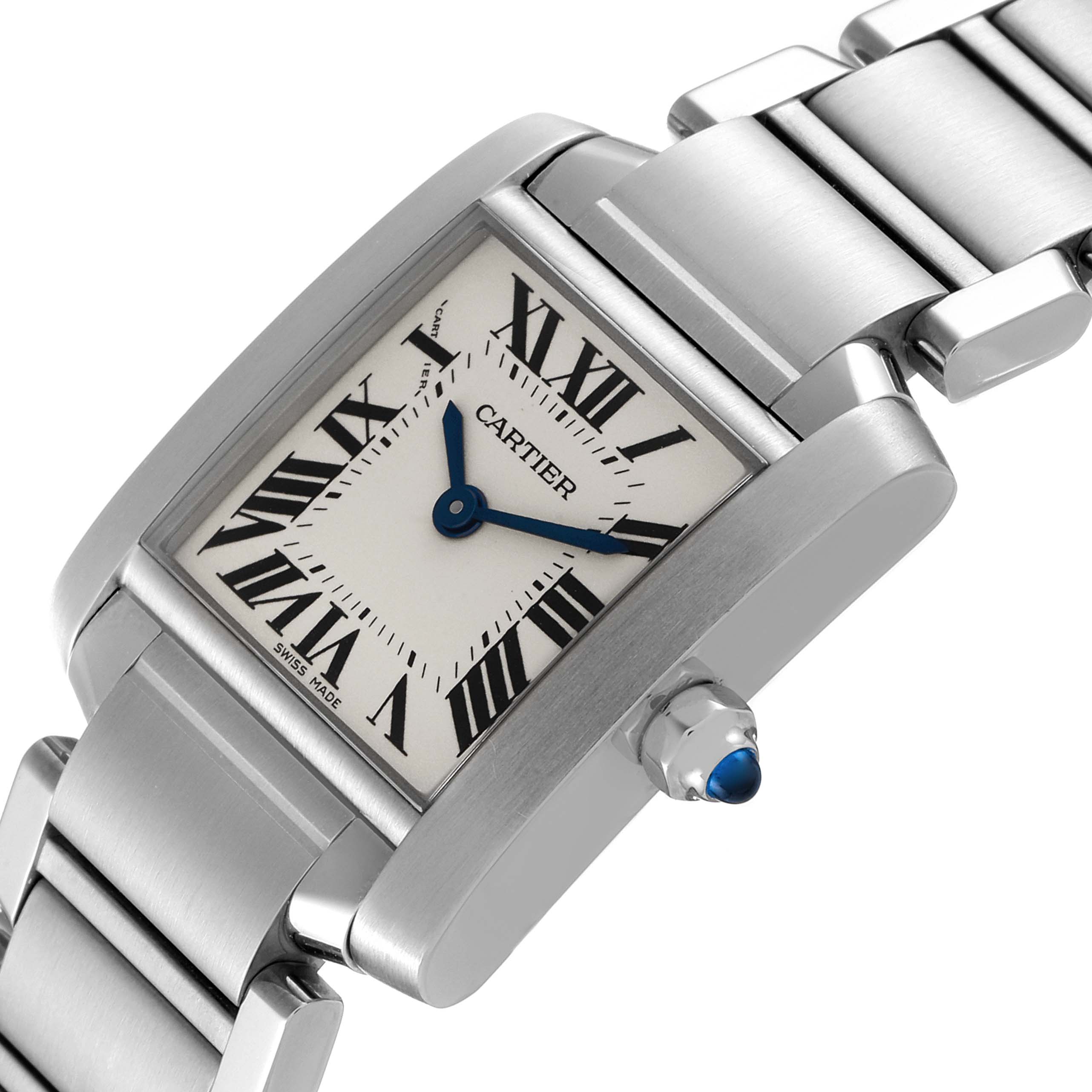 The Cartier Tank Francaise W51008Q3 Women's Stainless Steel Silver Dial W51008Q3 Women's Stainless Steel Silver Dial watch is shown at an angle displaying the face, bracelet, and crown with a blue cabochon.
