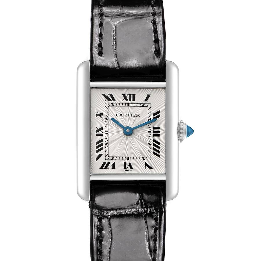 The Cartier Tank Louis watch is shown from a top-down angle with its dial, hands, and crown visible.