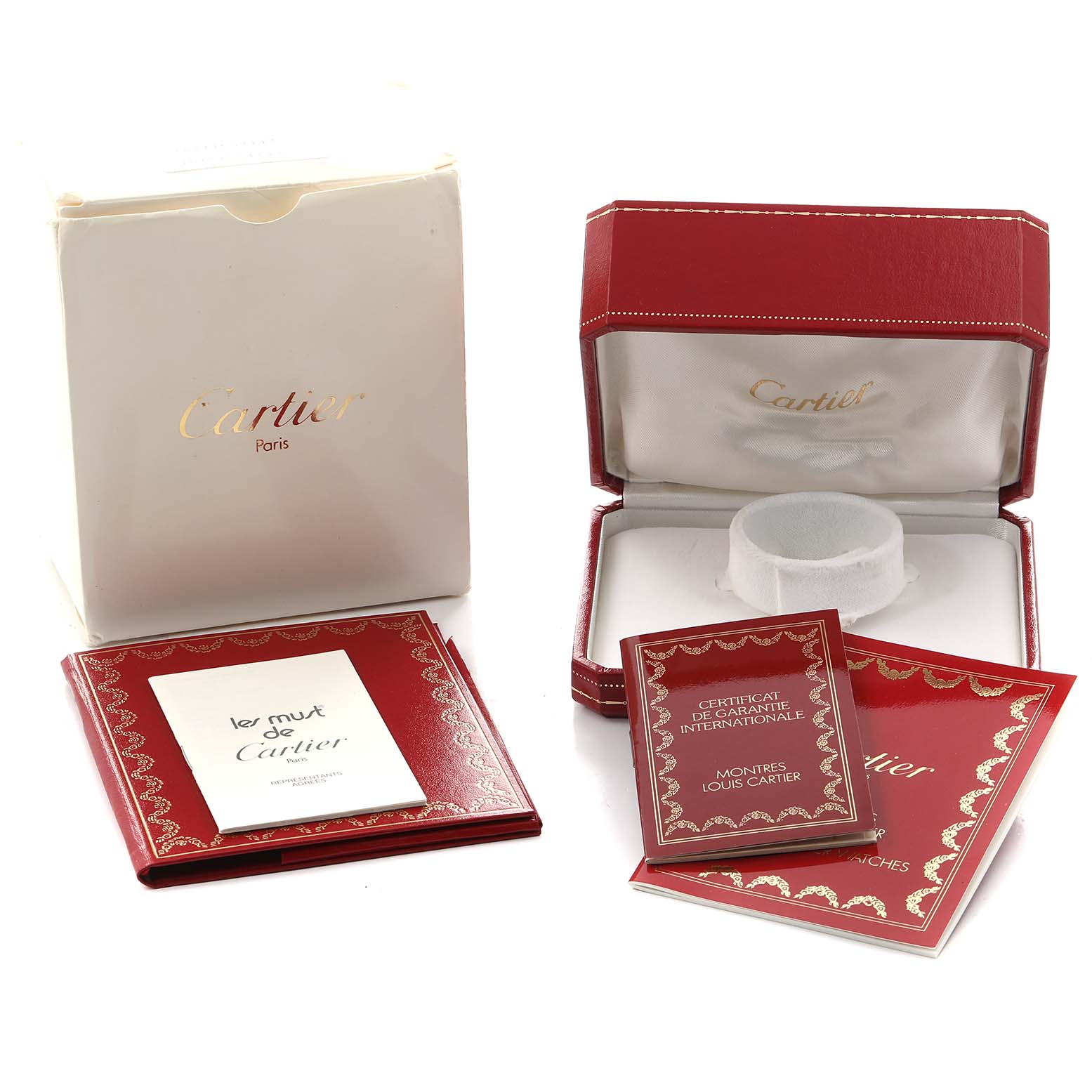 The image shows packaging and accessories for a Cartier Tank Louis W1509251 Women's Platinum Silver Dial model watch, including a box and booklets.