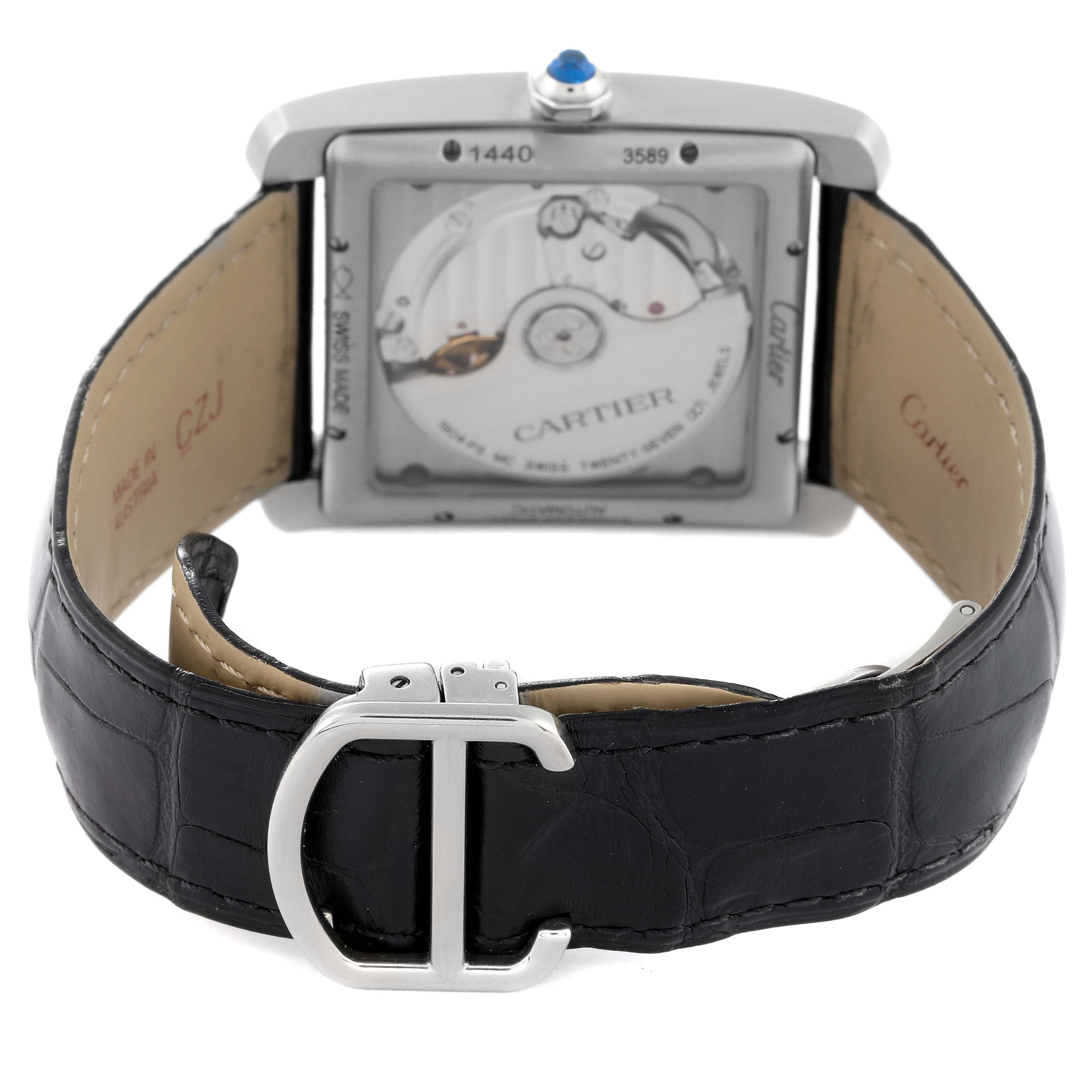 The Cartier Tank MC W5330003 Men
s Stainless Steel Silver Dial W5330003 Men
s Stainless Steel Silver Dial watch is shown from the rear, highlighting the movement and black leather strap with clasp.